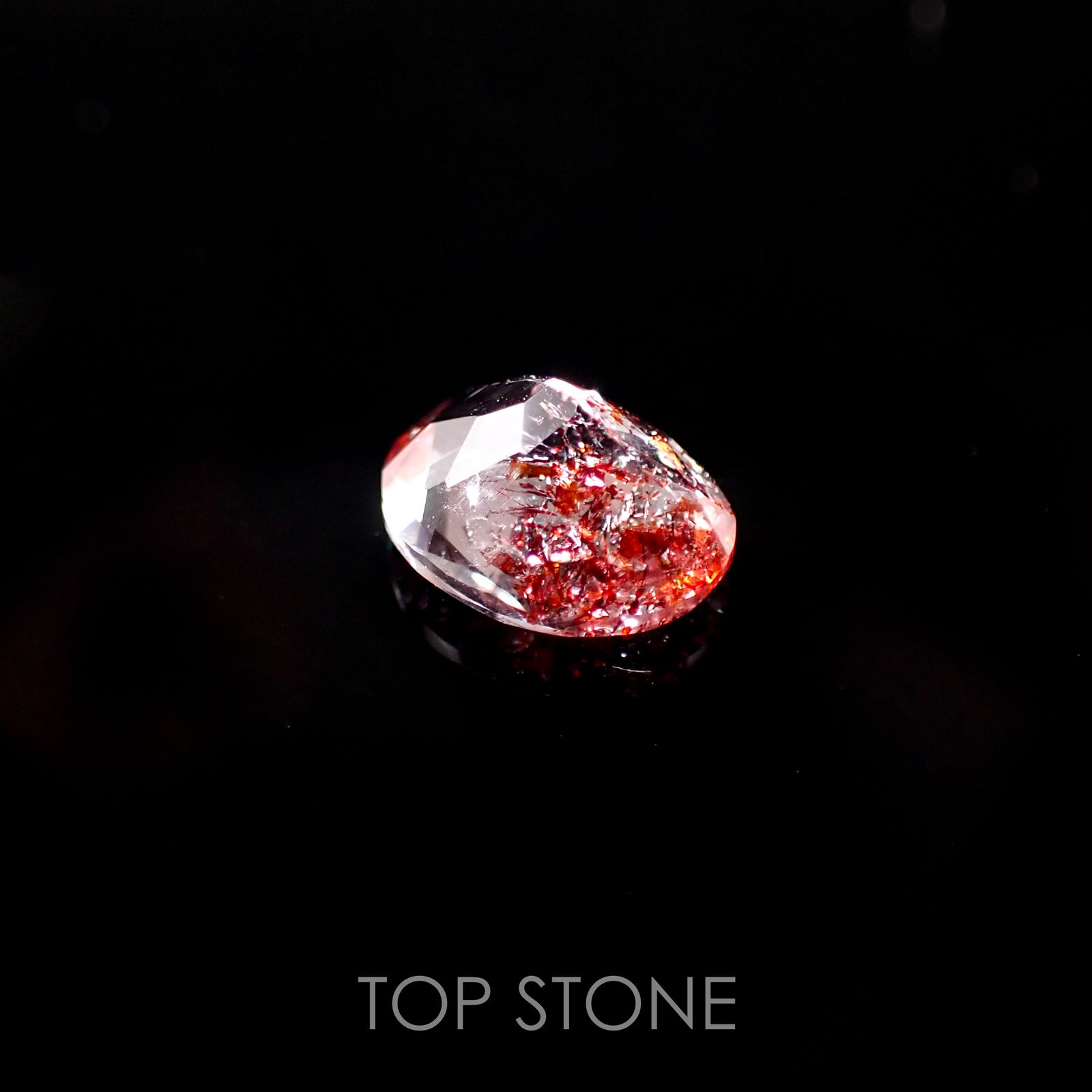 ファイヤークォーツ ナイジェリア産 ルース 1.45ct[210510711]8.5×6.8mm前後