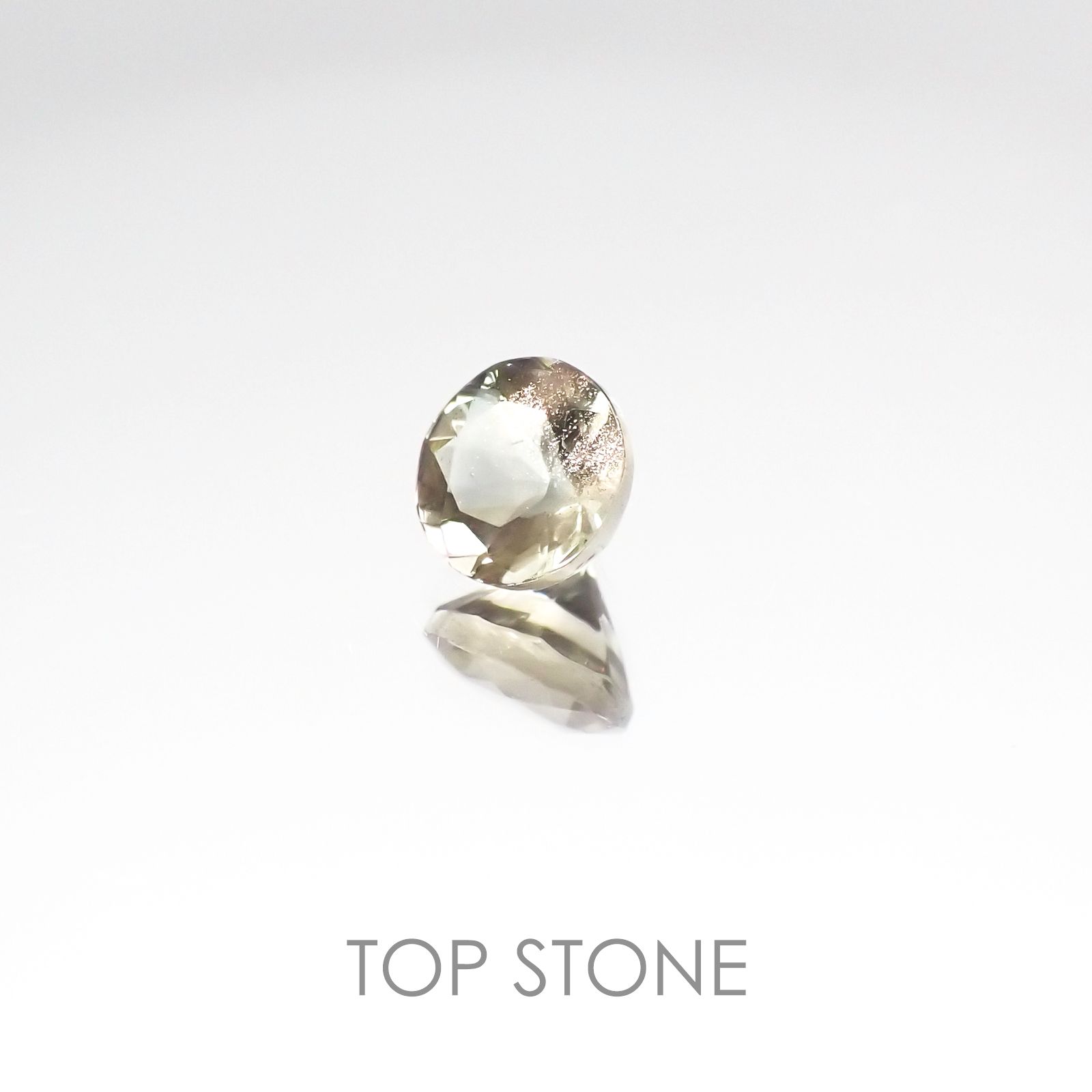 バイカラーオレゴンサンストーン アメリカ産 ルース 0.52ct[20107100]5×5mm前後