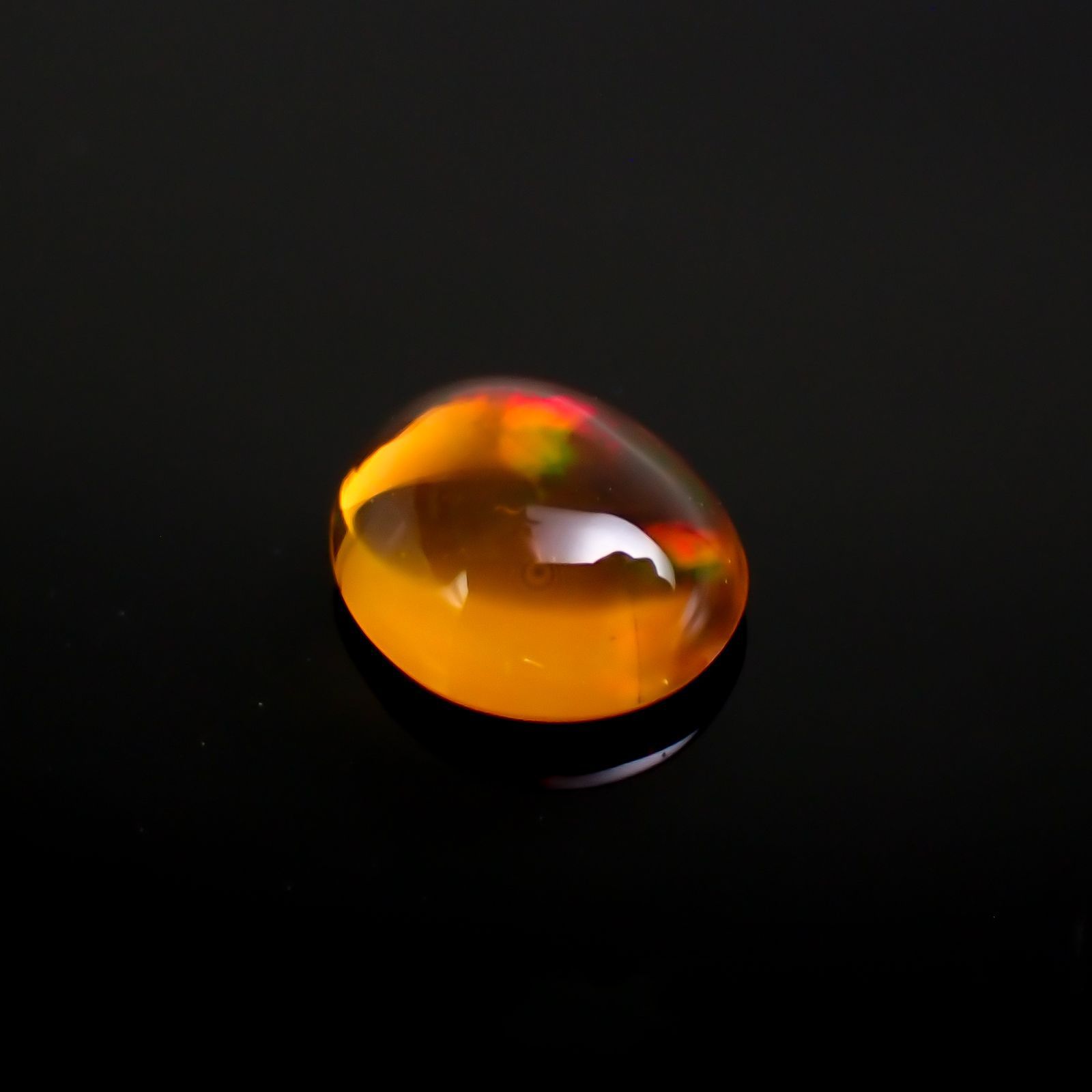 ファイヤーオパール(宝石名ファイヤー・オパール)メキシコ産 0.79ct 識別済[231023916]7.4x6.4mm前後