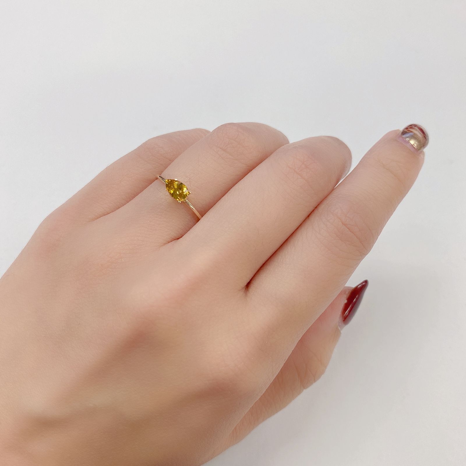 クリノヒューマイト(宝石名クリノヒューマイト) パキスタン産 0.478ct ソ付(CGL)[21059601]6.1×4.1mm前後