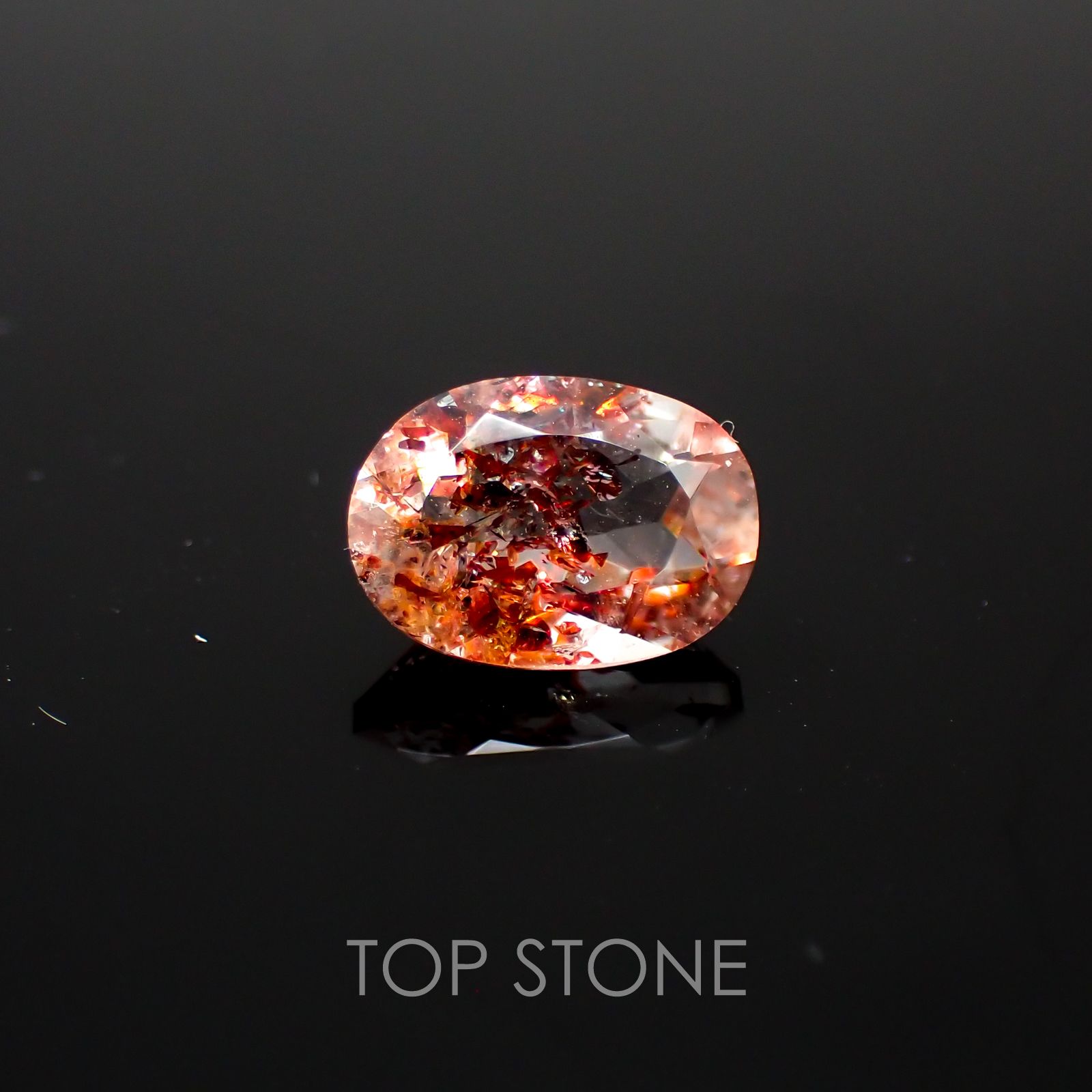 ファイヤークォーツ ナイジェリア産 ルース 1.41ct[210410202]8.7×6.3mm前後