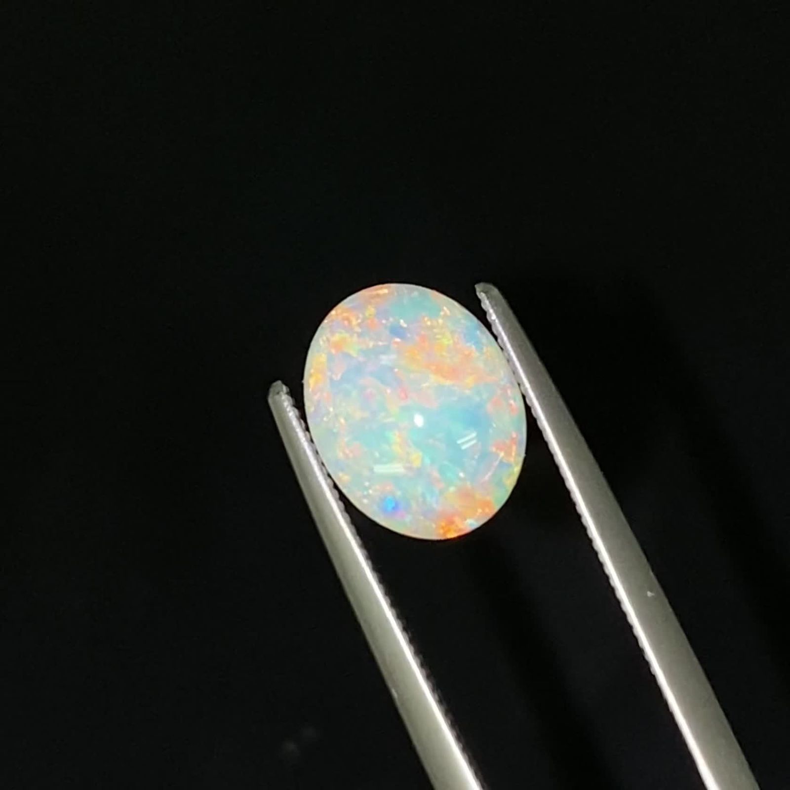 オパール オーストラリア産 1.47ct / 10x8mm前後 [231225214] | TOP