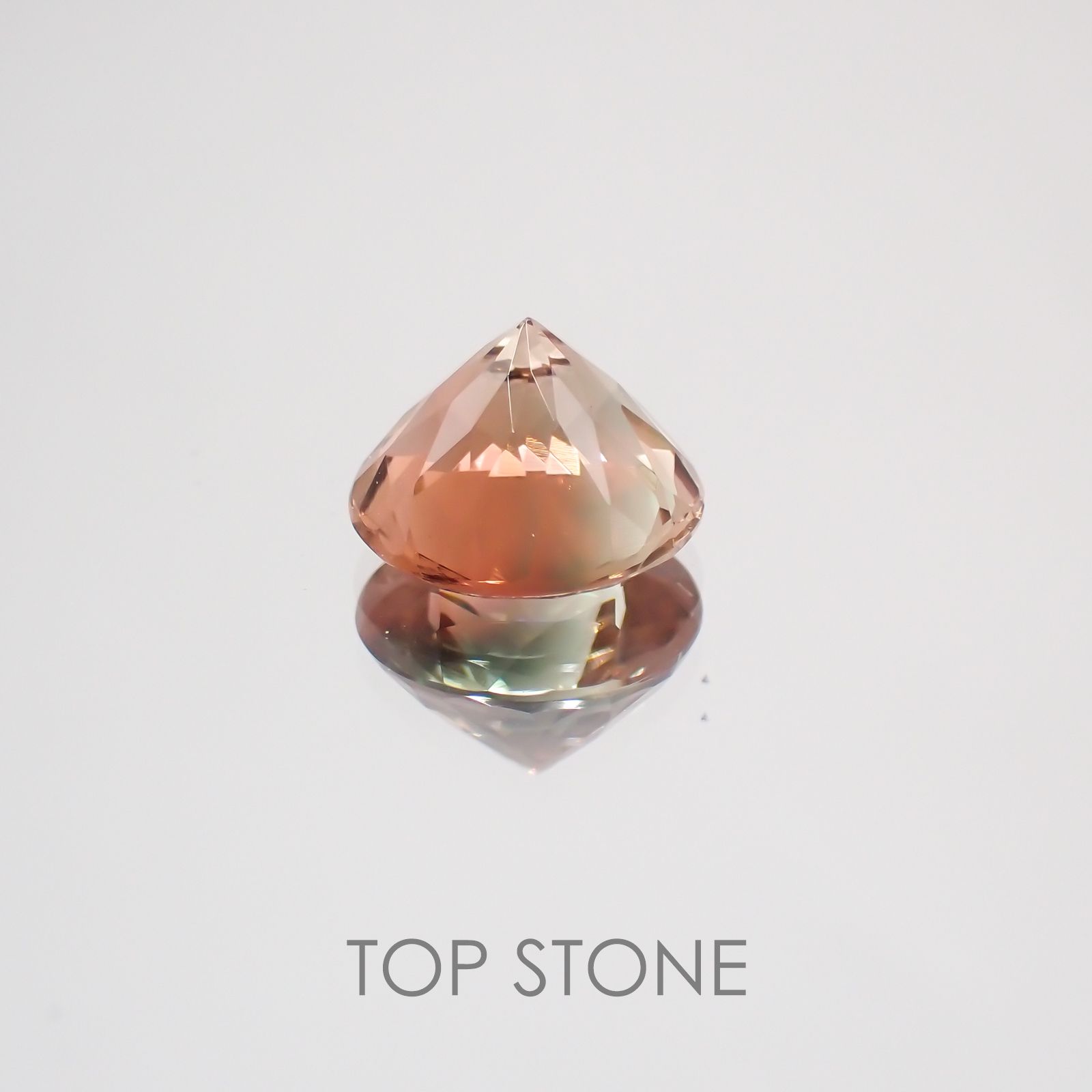 バイカラーオレゴンサンストーン(宝石名バイカラー・ラブラドライト) アメリカ・オレゴン州産ス 1.700ct ソ付(彩珠)[210410538]8×7.9mm前後