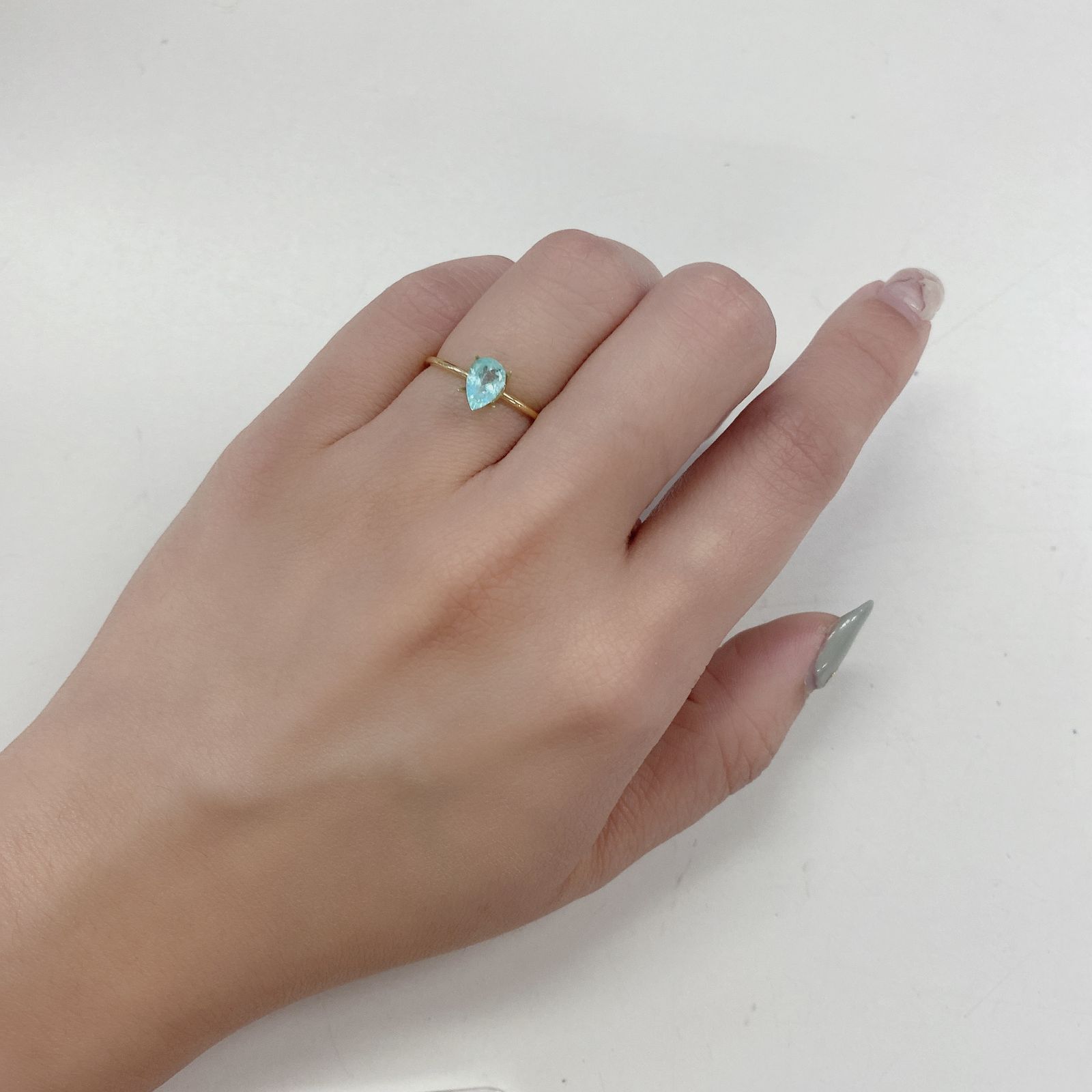 パライバトルマリン(宝石名トルマリン/別名パライバ・トルマリン) ブラジル・キントス鉱山産 0.543ct ソ付(宝貴協)[210410355]6.8×4.6mm前後