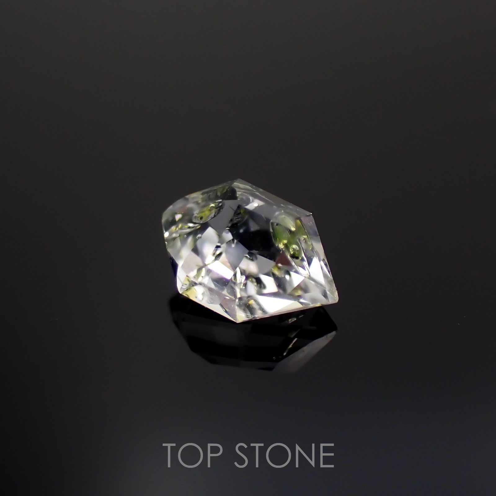 ◇カスタムカット◇オイルインクォーツ パキスタン産 0.60ct[221018542]7x4.4mm前後