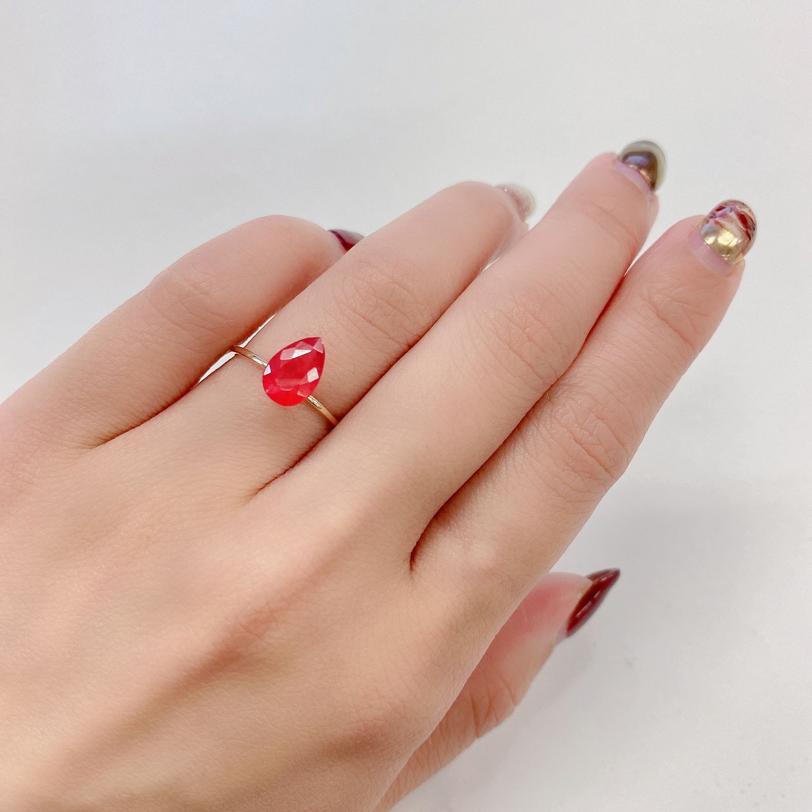 ロードナイト(宝石名ロードナイト) ブラジル産 1.58ct 識別済[21028333]9.3×6.4mm前後