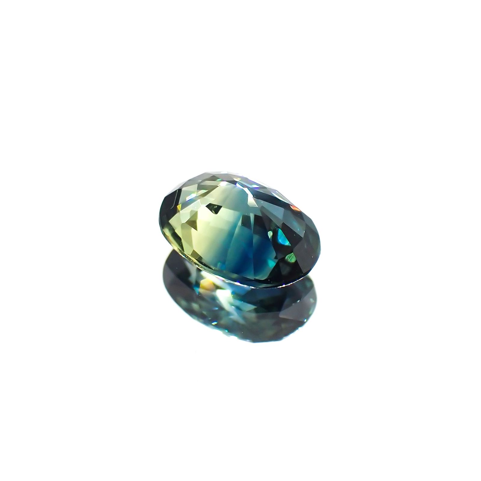 バイカラーサファイア(宝石名バイカラー・サファイア)マダガスカル/オーストラリア産 識別済 1.00ct / 6.9x4.9mm前後 [220114083]