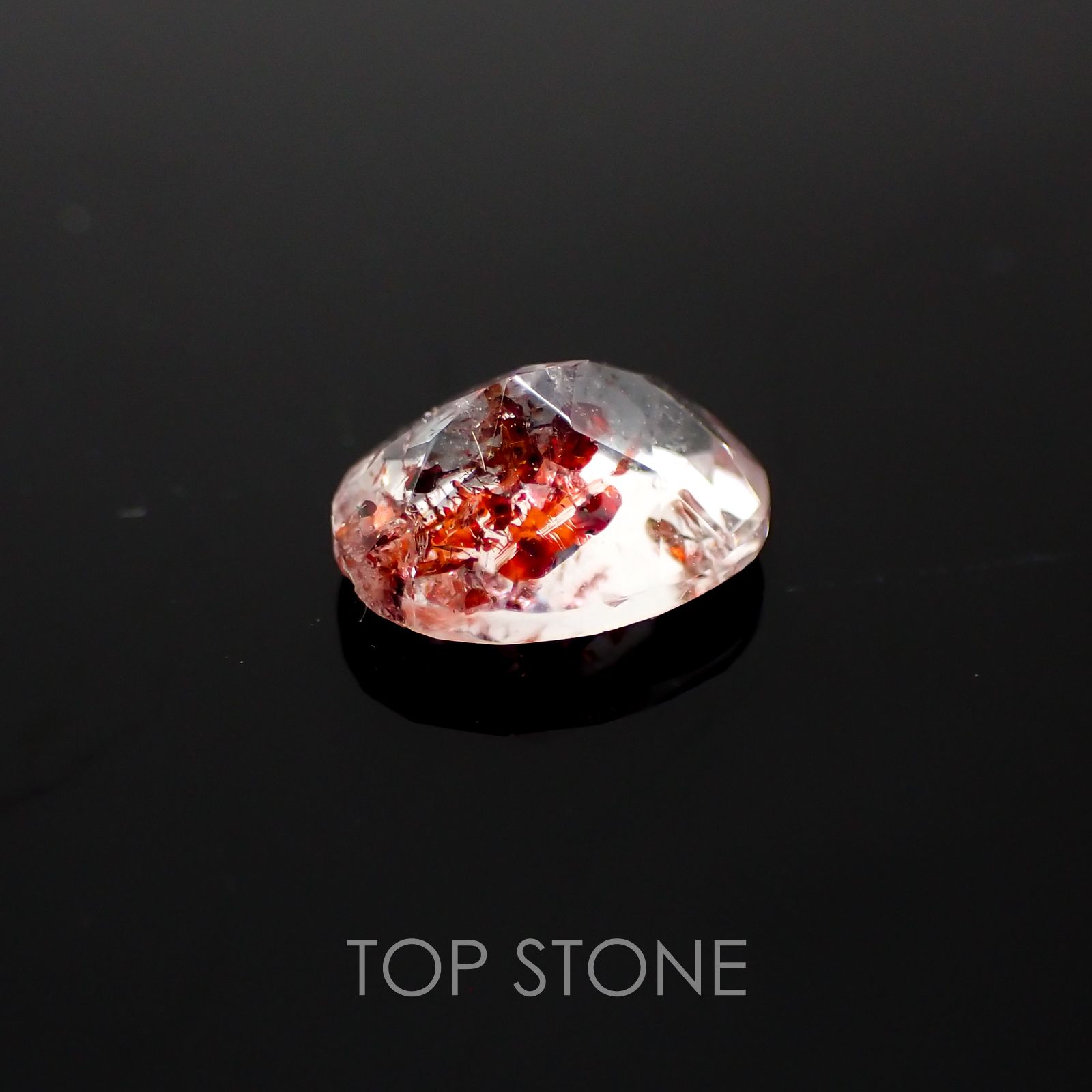 ファイヤークォーツ ナイジェリア産 ルース 1.4ct[210410203]8.3×6.8mm前後