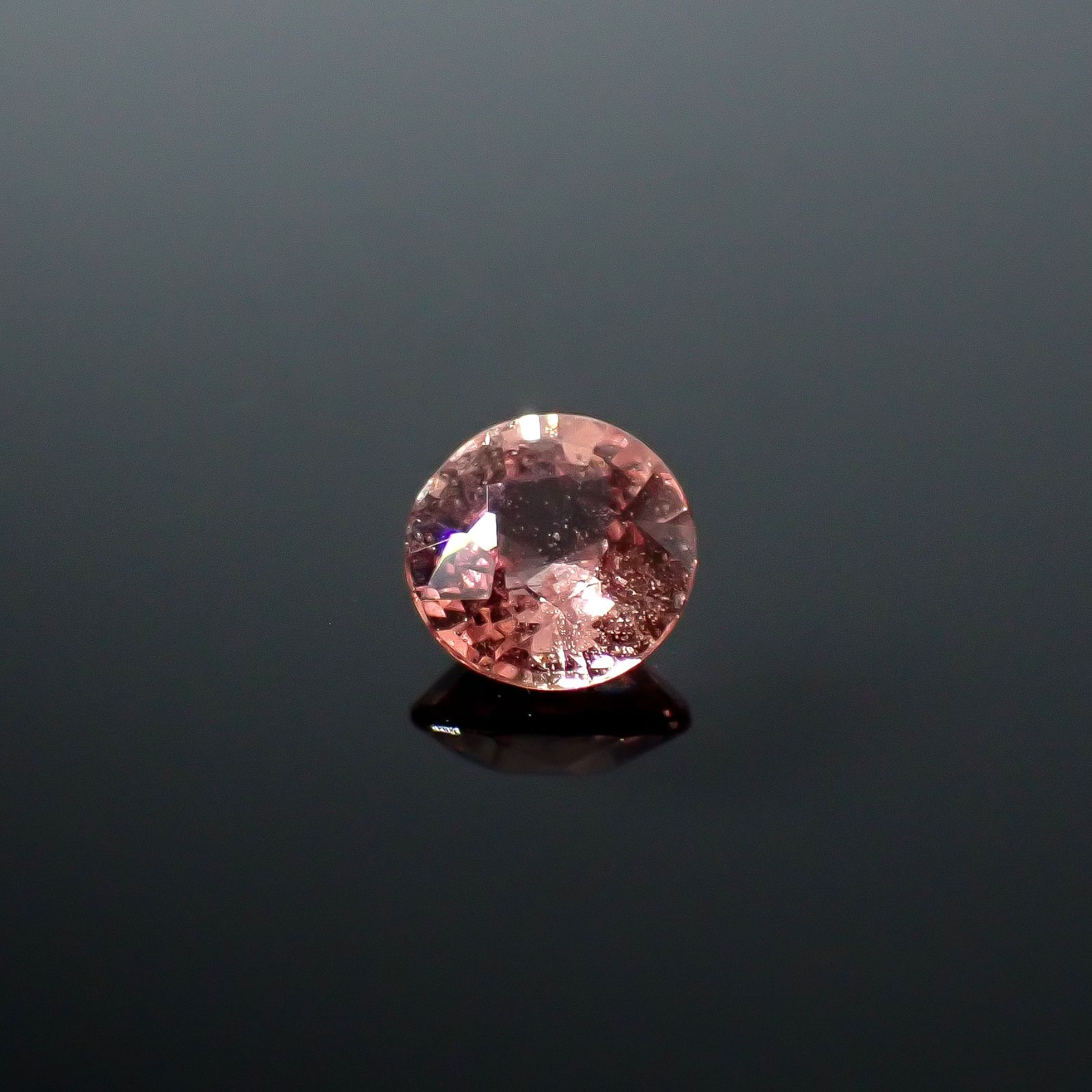 パパラチャサファイア(宝石名サファイア/別名パパラチャ・サファイア)スリランカ/マダガスカル産 DGL鑑付 0.553ct / 4.86x4.93mm前後 [251031289]