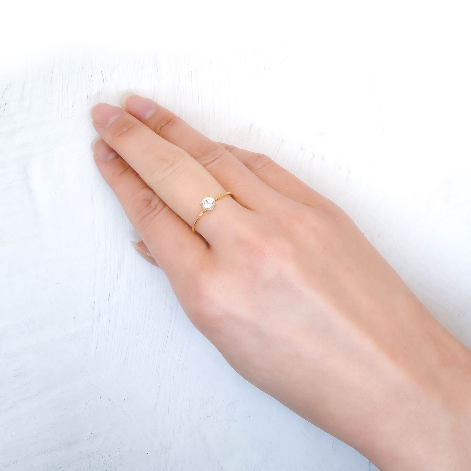 フェナカイト ロシア産 0.32ct / 4.4x4.4mm前後 [260231708]