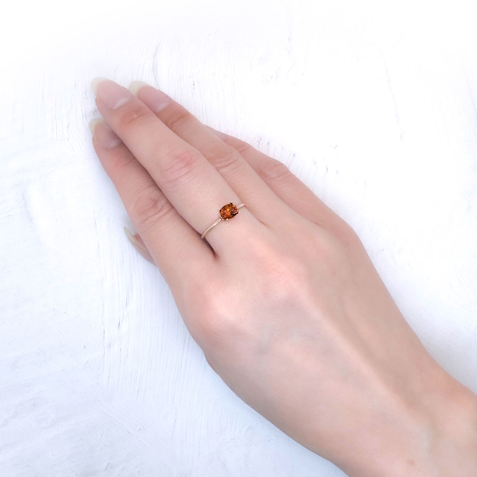 オレンジゾイサイト(宝石名ゾイサイト)タンザニア産 識別済 0.69ct / 5.4x4.4mm前後 [251231473]