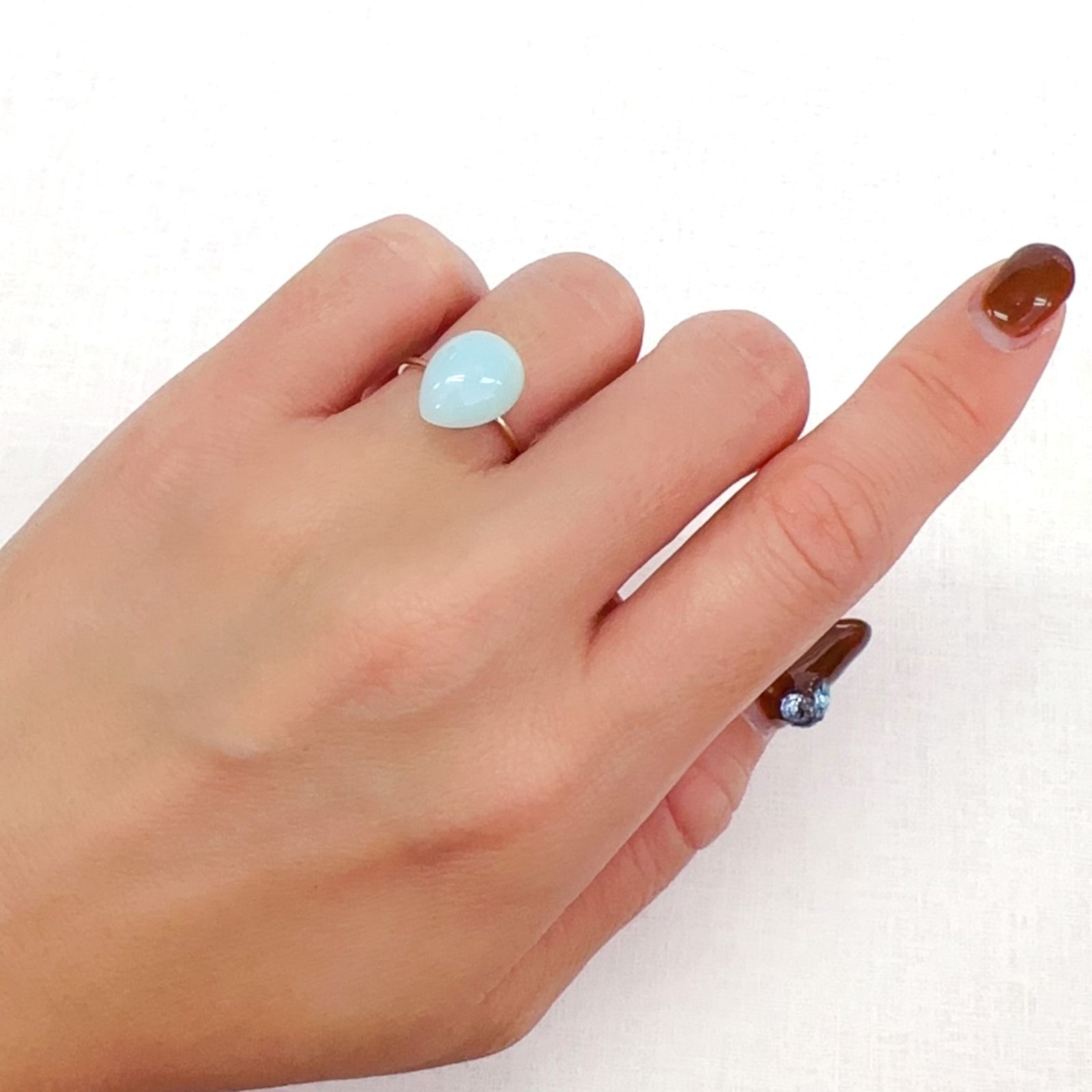 ブルーオパール(宝石名ブルー・コモン・オパール)ペルー産 3.251ct ソ付(彩珠)[231023988]12.5x9.6mm前後