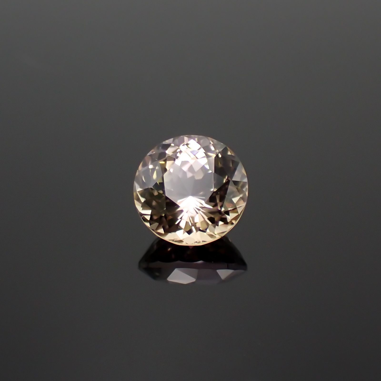 マジカルゾイサイト 非加熱(宝石名ゾイサイト)タンザニア産 ソ付(彩珠) 2.203ct / 7.8x7.8mm前後 [221018874]