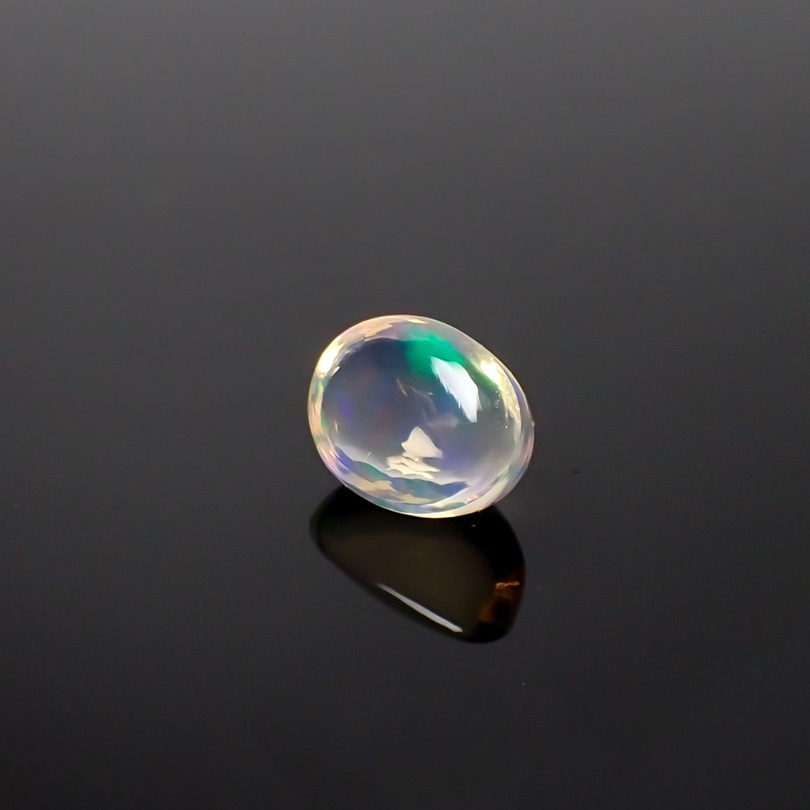 メキシコオパール(宝石名オパール) メキシコ産 ソ付(彩珠) 1.756ct / 8.8x6.6mm前後 [210712136]