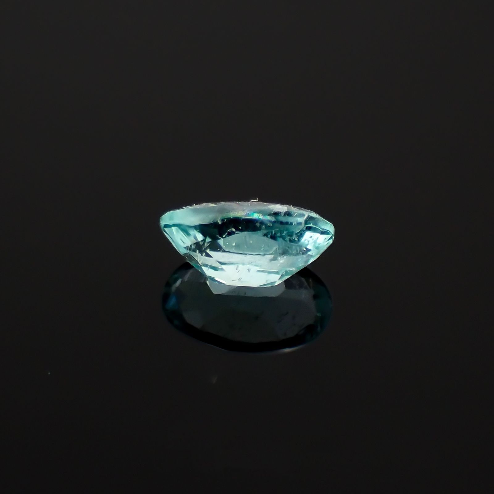パライバトルマリン(宝石名トルマリン/別名パライバ・トルマリン)モザンビーク産 識別済 0.24ct / 5x3mm前後 [230220371]
