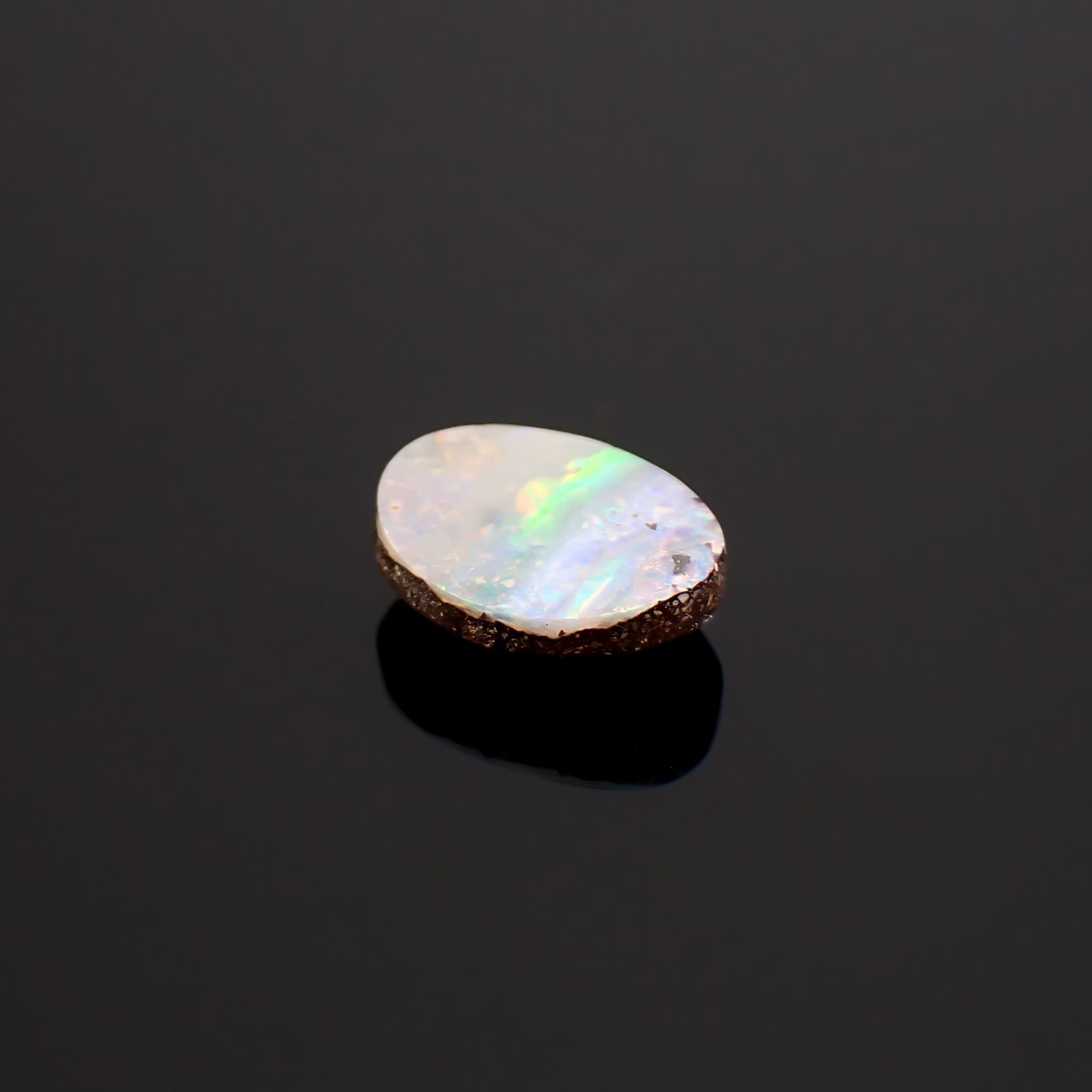 ボルダーオパール オーストラリア産 1.47ct / 9.7x7.7mm前後 [260933078]