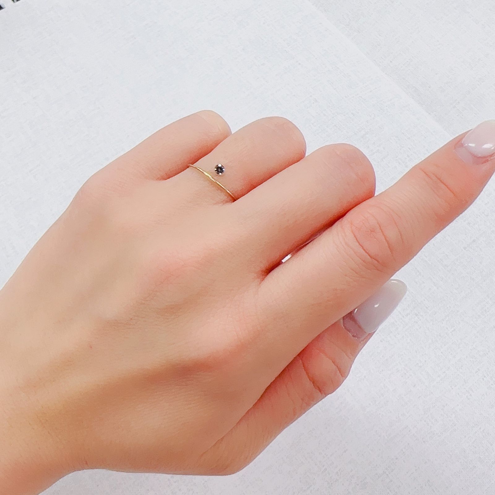 カラーチェンジガーネット アレキタイプ マダガスカル・ベキリー産 0.072ct[230119891]2.5x2.4mm前後