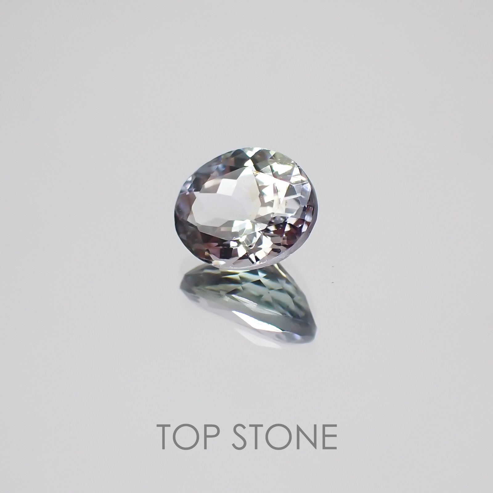 パーティカラータンザナイト(宝石名パーティカラード・ゾイサイト) タンザニア産 1.382ct ソ付(彩珠)[20074303]7.5×6.2mm前後