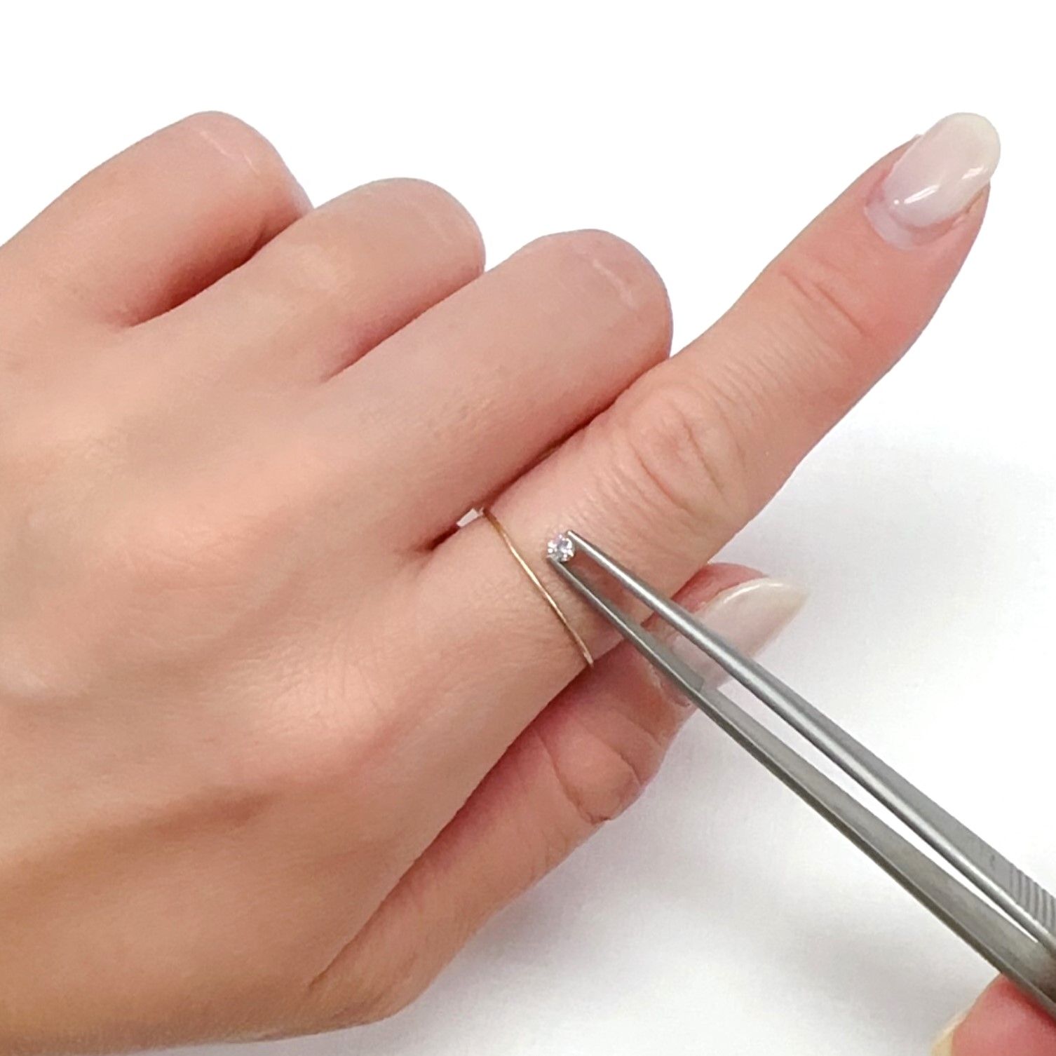 ピンクダイヤモンド(宝石名ダイアモンド SI-2/FANCY LIGHT ORANGY PINK) 0.046ct ソ付(CGL)[240326638]2.38x2.41mm前後
