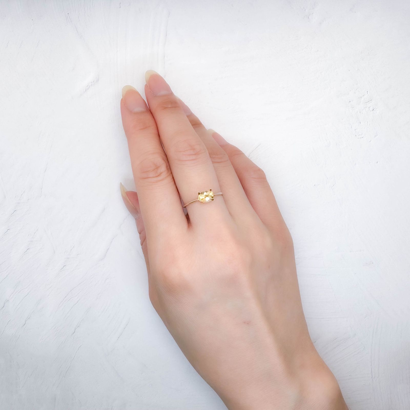 インペリアルトパーズ(宝石名トパーズ)ブラジル産 0.78ct / 6.2x4.9mm前後 [250630493]