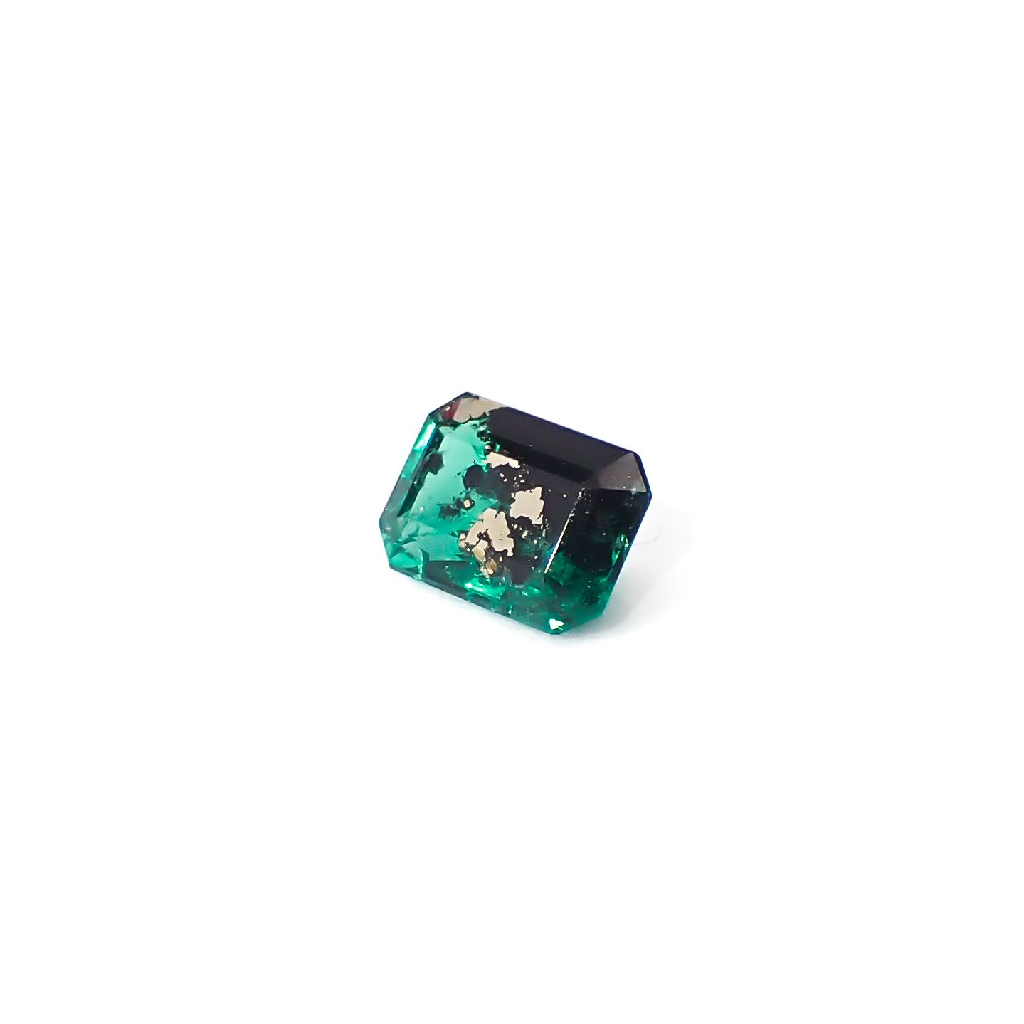 パイライトインエメラルド コロンビア産 0.75ct / 6.5x4.5mm前後 [260532119]