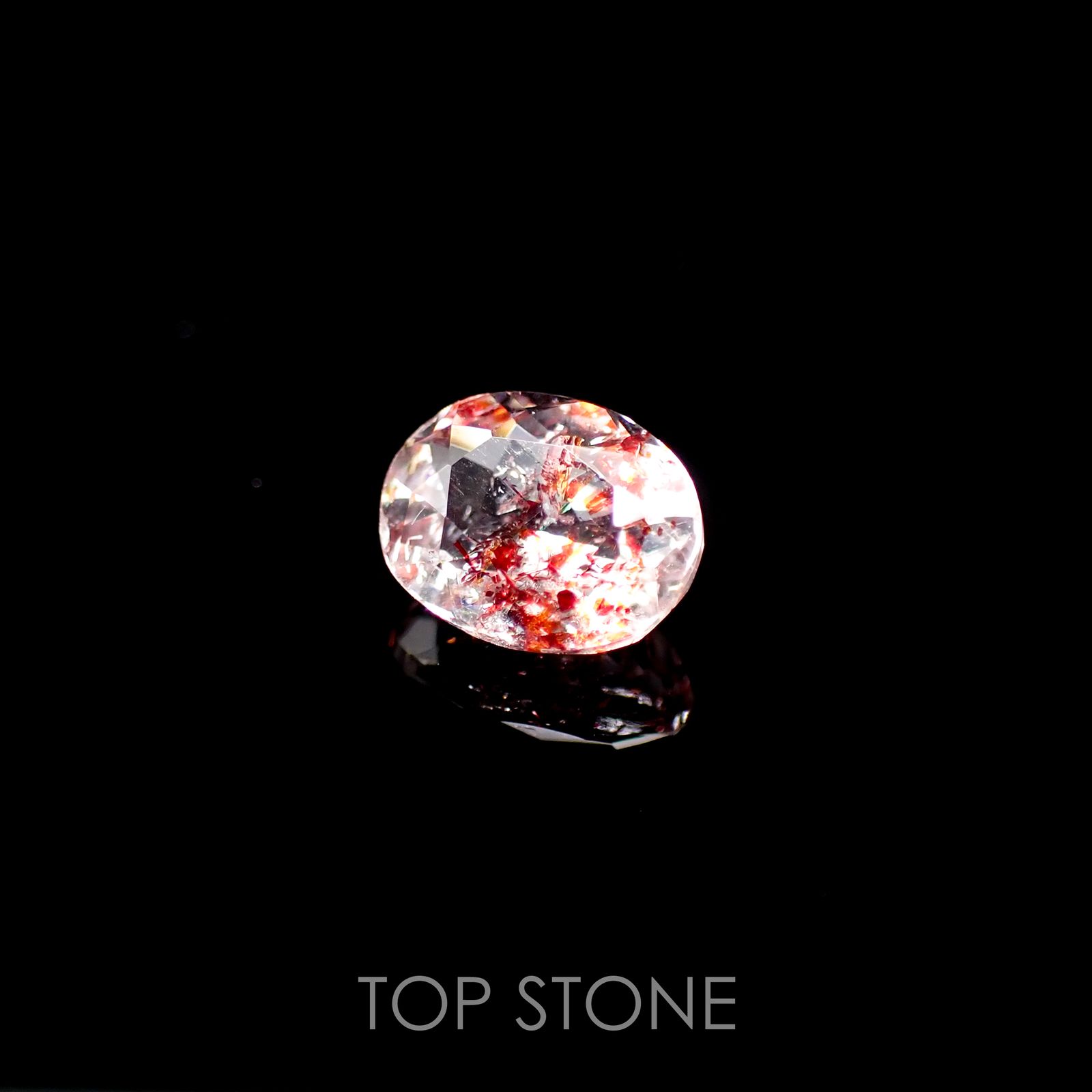 ファイヤークォーツ ナイジェリア産 ルース 0.99ct[210510706]7.4×5.8mm前後