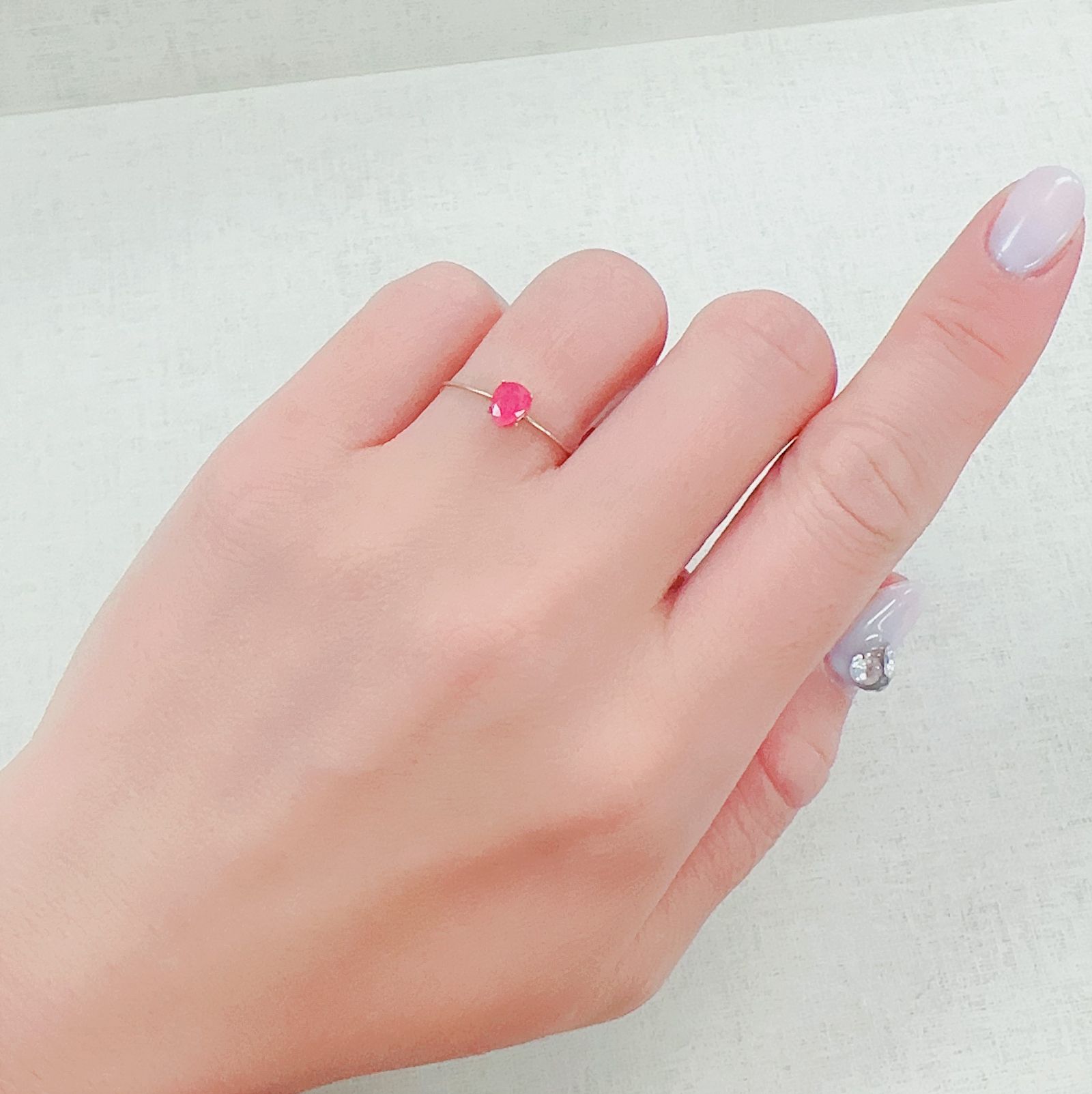ツグツパイト(宝石名タグトゥパイト)グリーンランド産 0.366ct ソ付(彩珠)[230421430]5.2x4.2mm前後