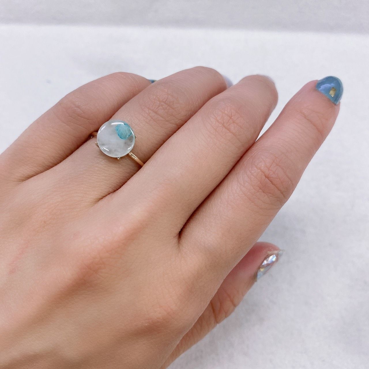 パライバトルマリンインクォーツ(宝石名トルマリンインクォーツ/別名パライバ・トルマリンインクォーツ) ブラジル産 1.612ct ソ付(宝貴協)[210812954]9.1×9.0mm前後
