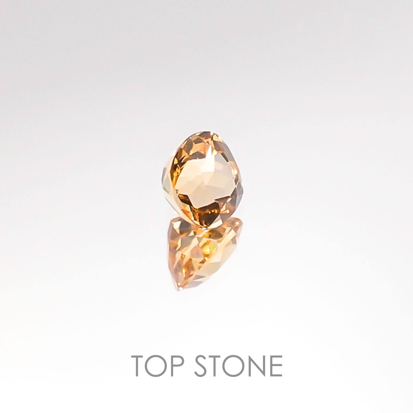 インペリアルトパーズ ブラジル産 ルース 0.61ct[20106511]4.7×4.6mm前後