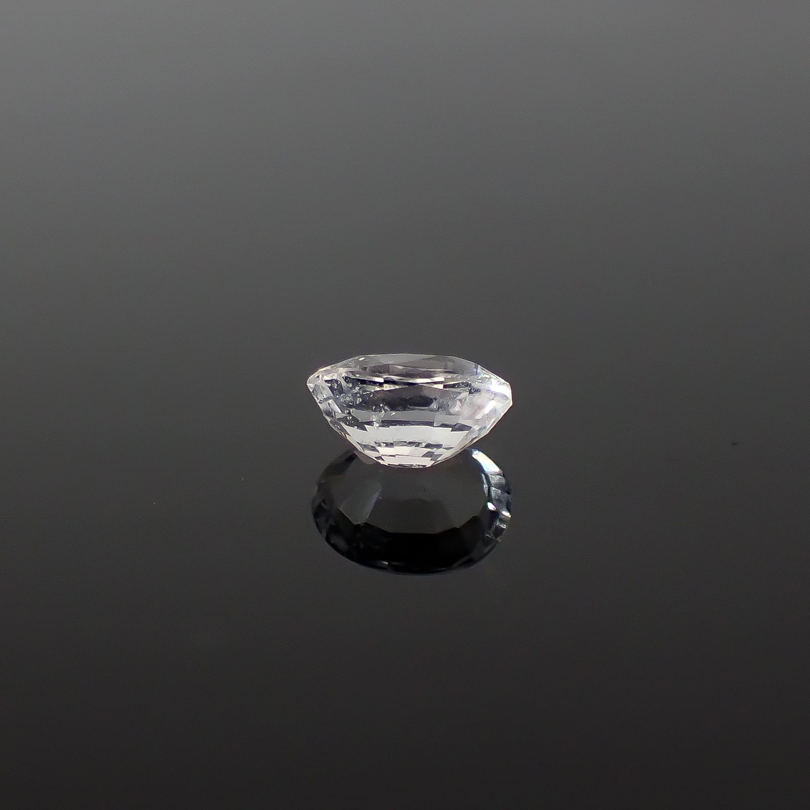 テネブレッセンススキャポライト アフガニスタン産 0.25ct / 4.8x3.5mm前後 [260432042]