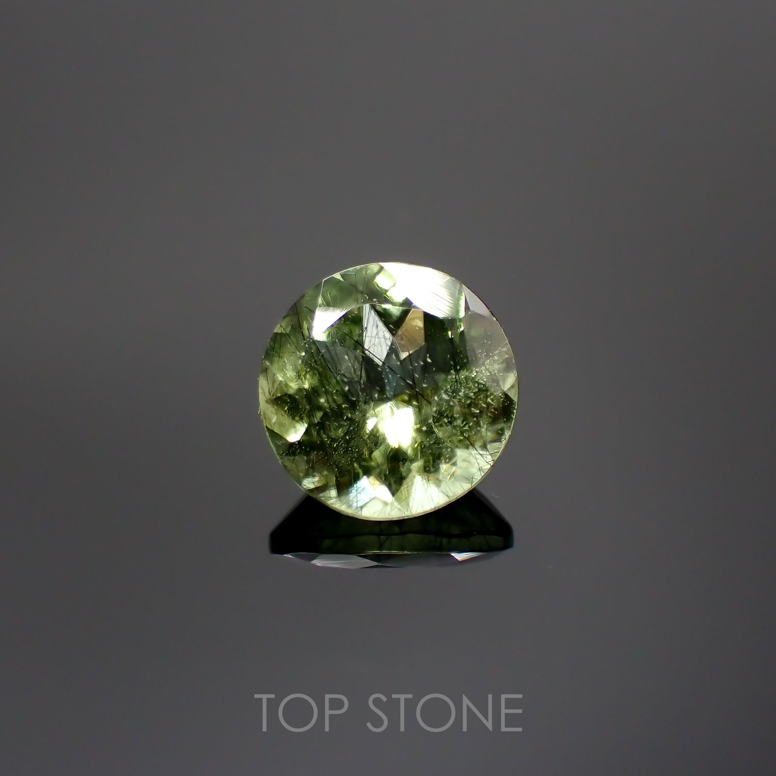 ルドウィジャイトインペリドット パキスタン産 ルース 1.36ct[210913495]7.2×7.1mm前後