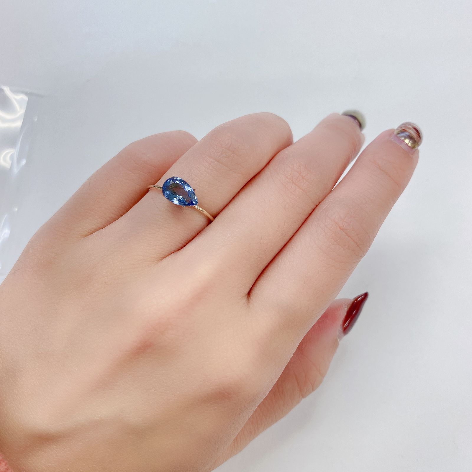 バイカラータンザナイト(宝石名タンザナイト) タンザニア産 1.371ct ソ付(彩珠)[210711815]8.7×5.5mm前後