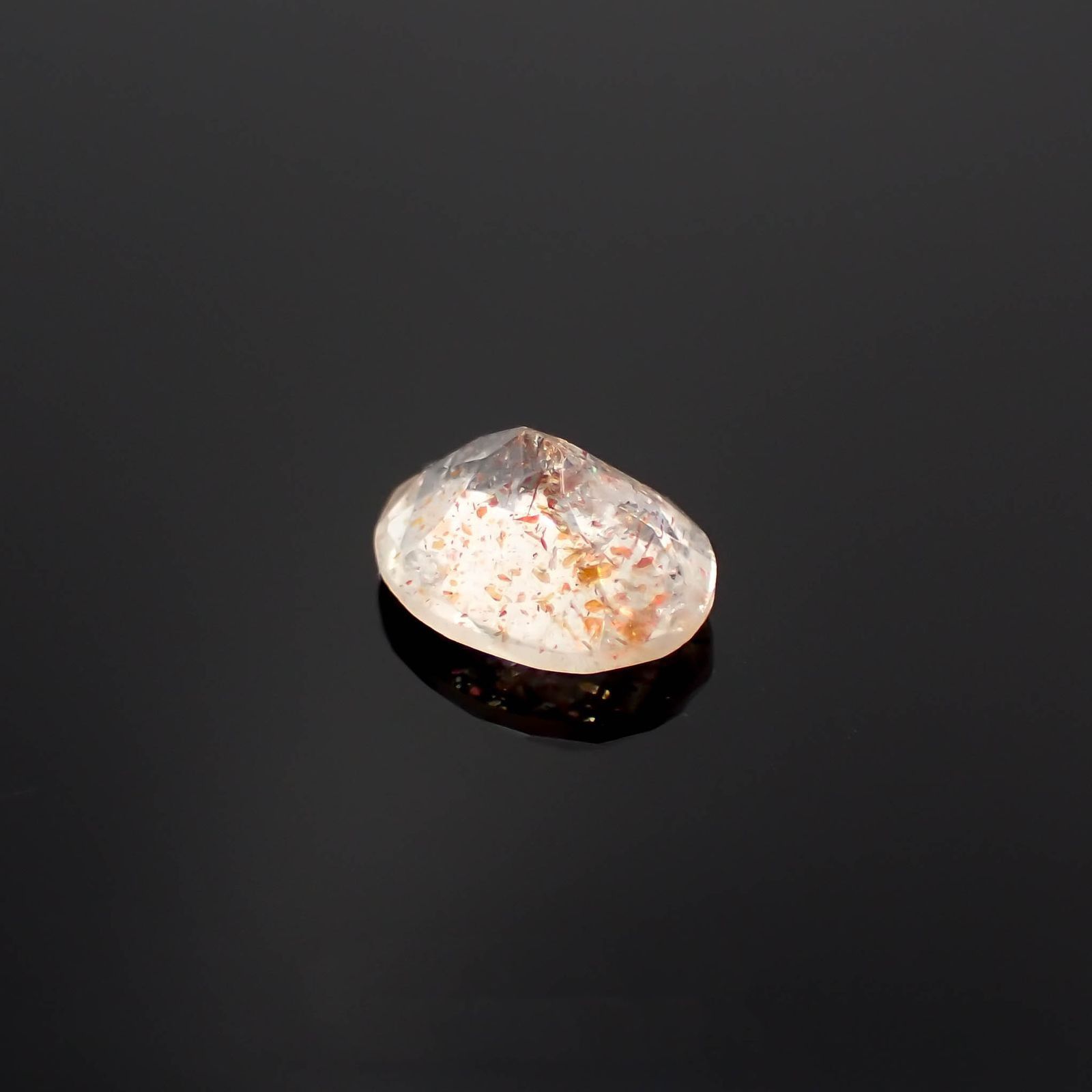 イリュージョンサンストーン タンザニア産 1.59ct / 9x7.1mm前後 [230120119]