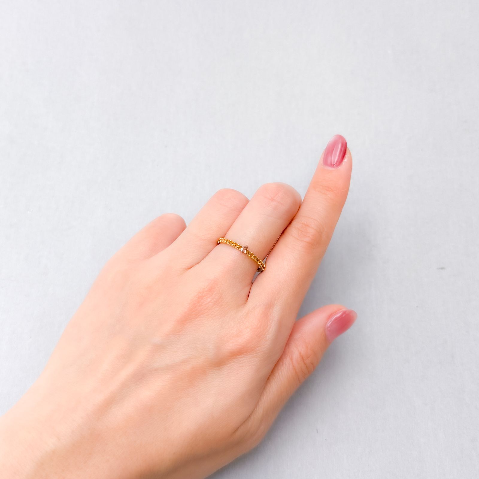 ピンクダイヤモンド(宝石名ダイアモンド SI-2/FANCY DEEP BROWNISH PINK) 0.058ct ソ付(AGT)[250129706]3.29x2.04mm前後