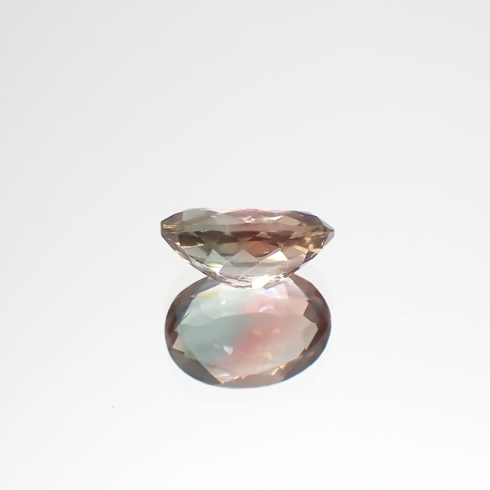 パーティカラーオレゴンサンストーン アメリカ・オレゴン州産 0.93ct[230722847]7.8x5.7mm前後