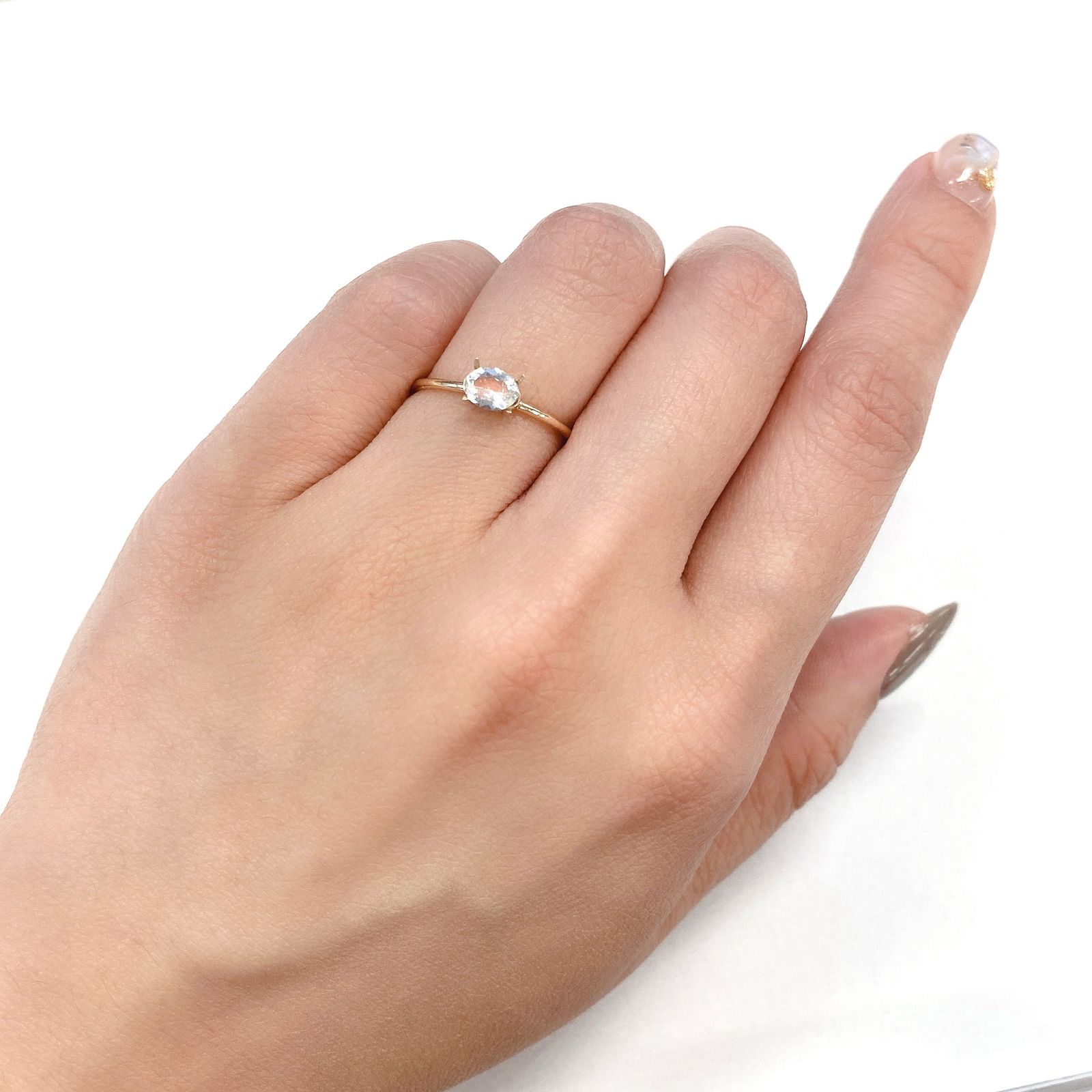 レインボームーンストーン(アンデシンラブラドライト) マダガスカル産 ルース 0.28ct[210410567]5.4×4.2mm前後