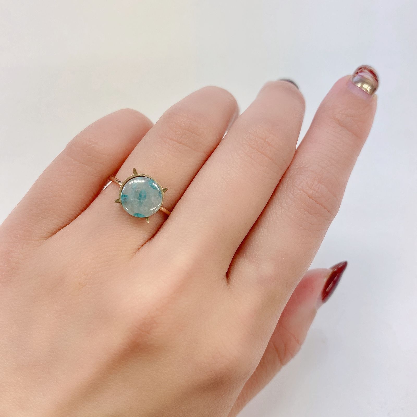 パライバトルマリンインクォーツ(宝石名トルマリンインクォーツ/別名パライバ・トルマリンインクォーツ) ブラジル産 1.635ct ソ付(宝貴協)[210812963]9.0×8.9mm前後