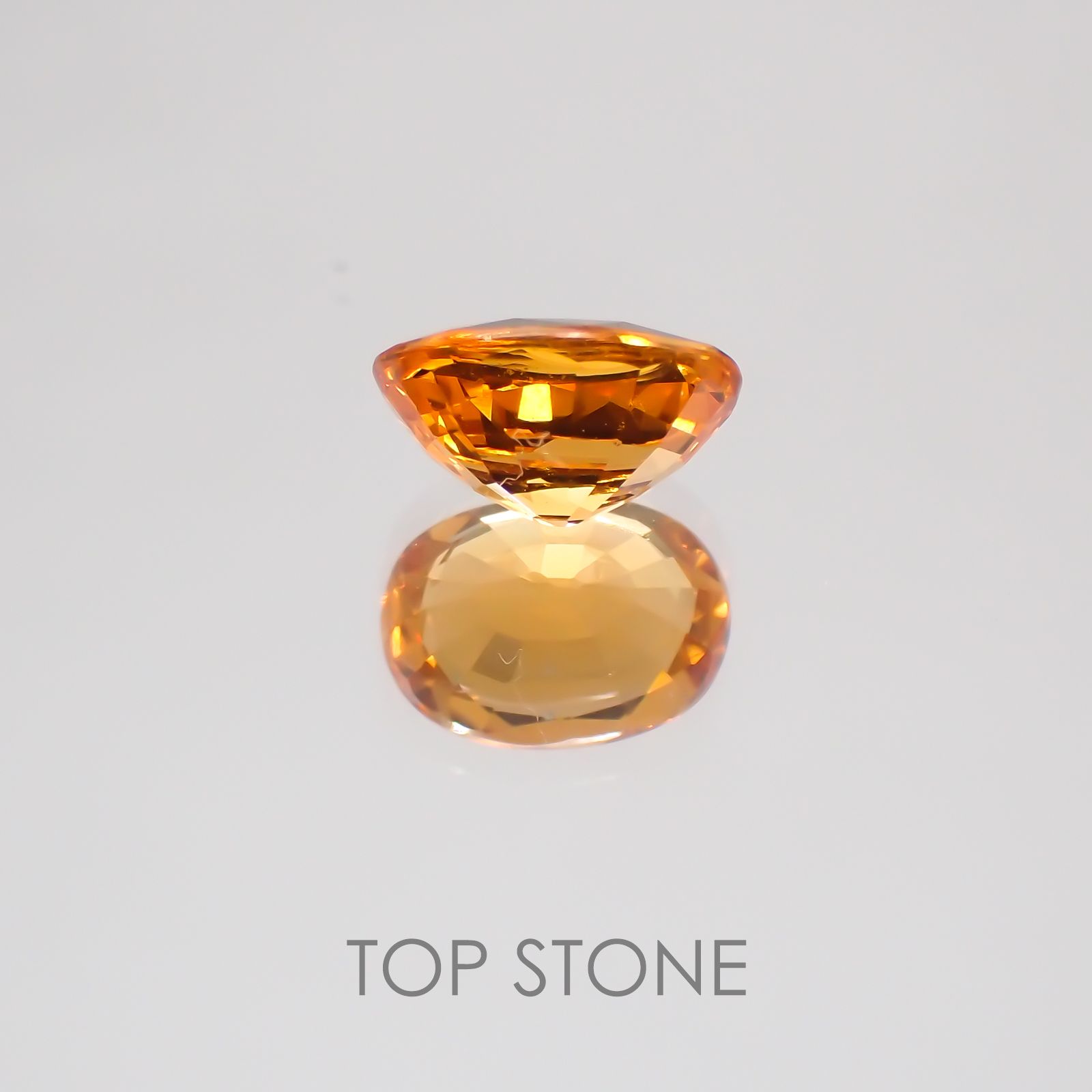 マンダリンガーネット(宝石名スペサルティン・ガーネット) ケニア産 1.199ct ソ付(彩珠)[21019448]7.1×5.1mm前後
