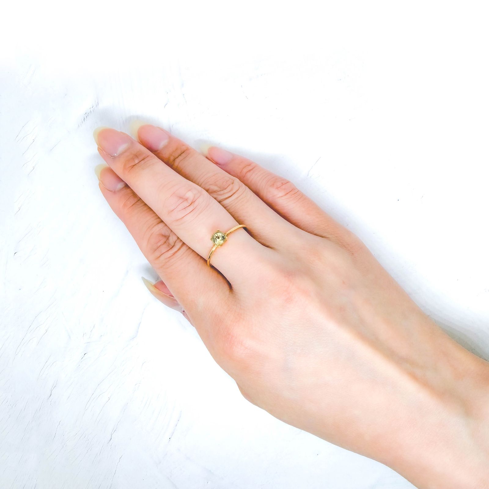 イエローアパタイト メキシコ産 0.56ct / 4.6x4.6mm前後 [260632468]