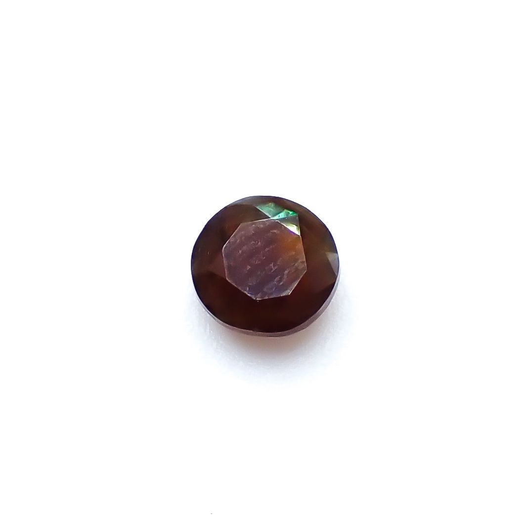 レインボーガーネット 日本・奈良県産 0.77ct / 5.5x5.4mm前後 [260932924]