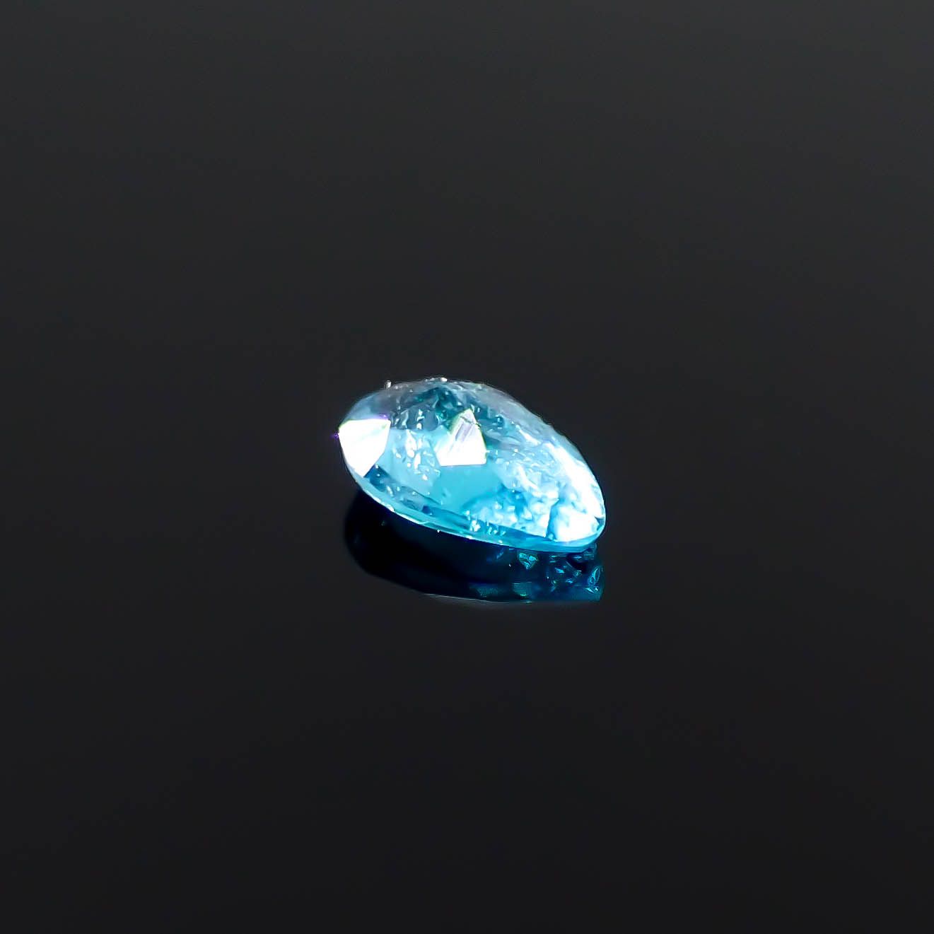 パライバトルマリン(宝石名トルマリン/別名パライバ・トルマリン)ブラジル・パライバ州バターリャ鉱山産 0.118ct ソ付(GGS)[250931069]4.1x2.8mm前後