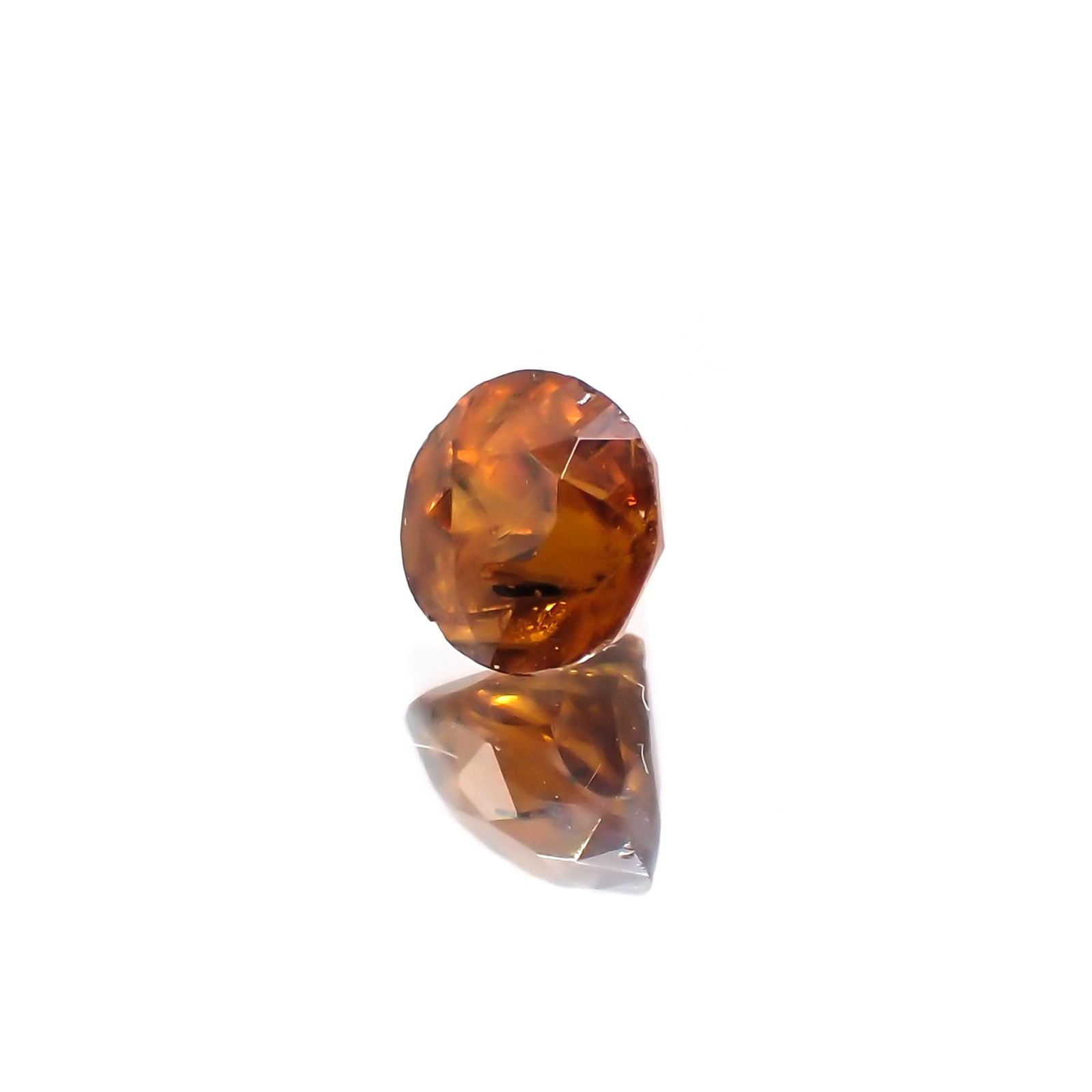 バストネサイト(宝石名バストネサイト)パキスタン産 ソ付(彩珠) 0.678ct / 4.5×4.5mm前後 [20128959]