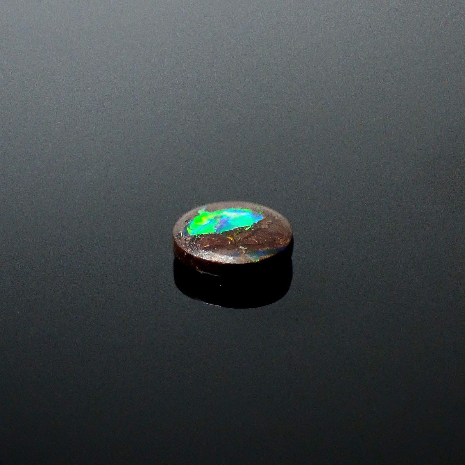 ウッドオパール オーストラリア産 0.16ct / 4x3.9mm前後 [251131299]