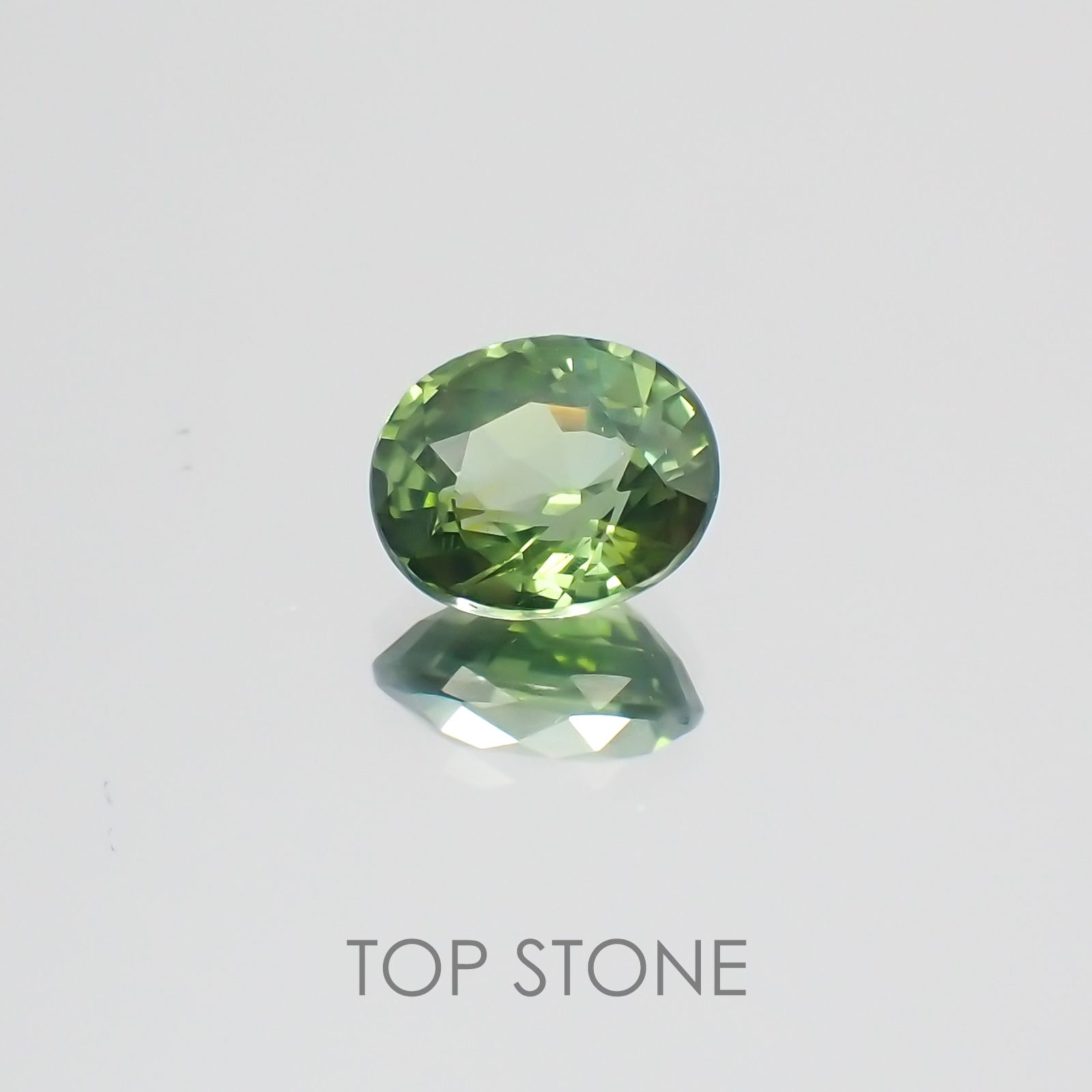 グリーンジルコン(宝石名ジルコン) スリランカ・カンボジア産 1.39ct 識別済[21038612]7.1×5.9mm前後