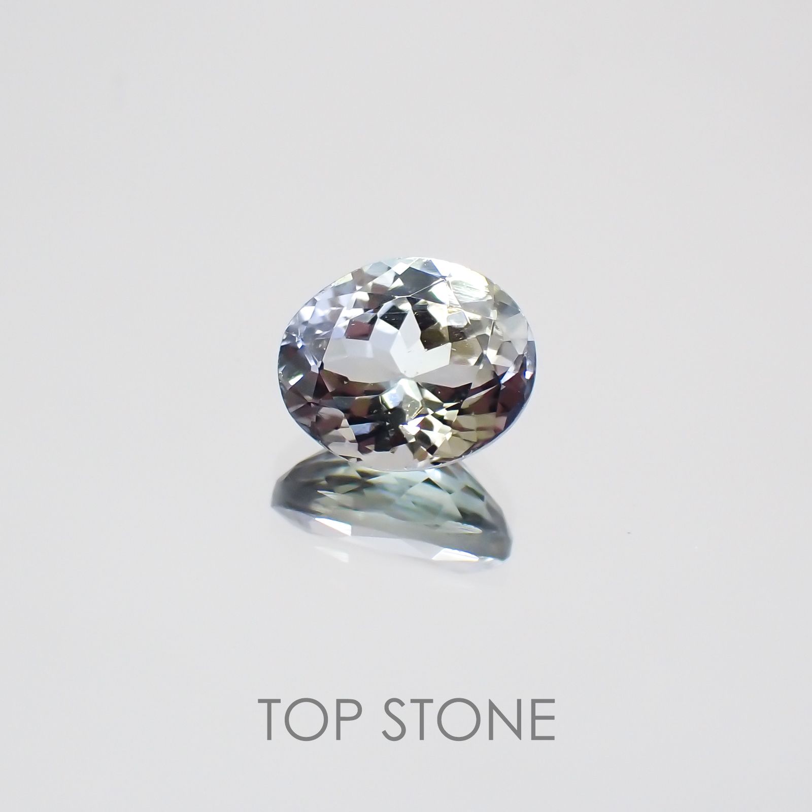 パーティカラータンザナイト(宝石名パーティカラード・ゾイサイト) タンザニア産 1.382ct ソ付(彩珠)[20074303]7.5×6.2mm前後