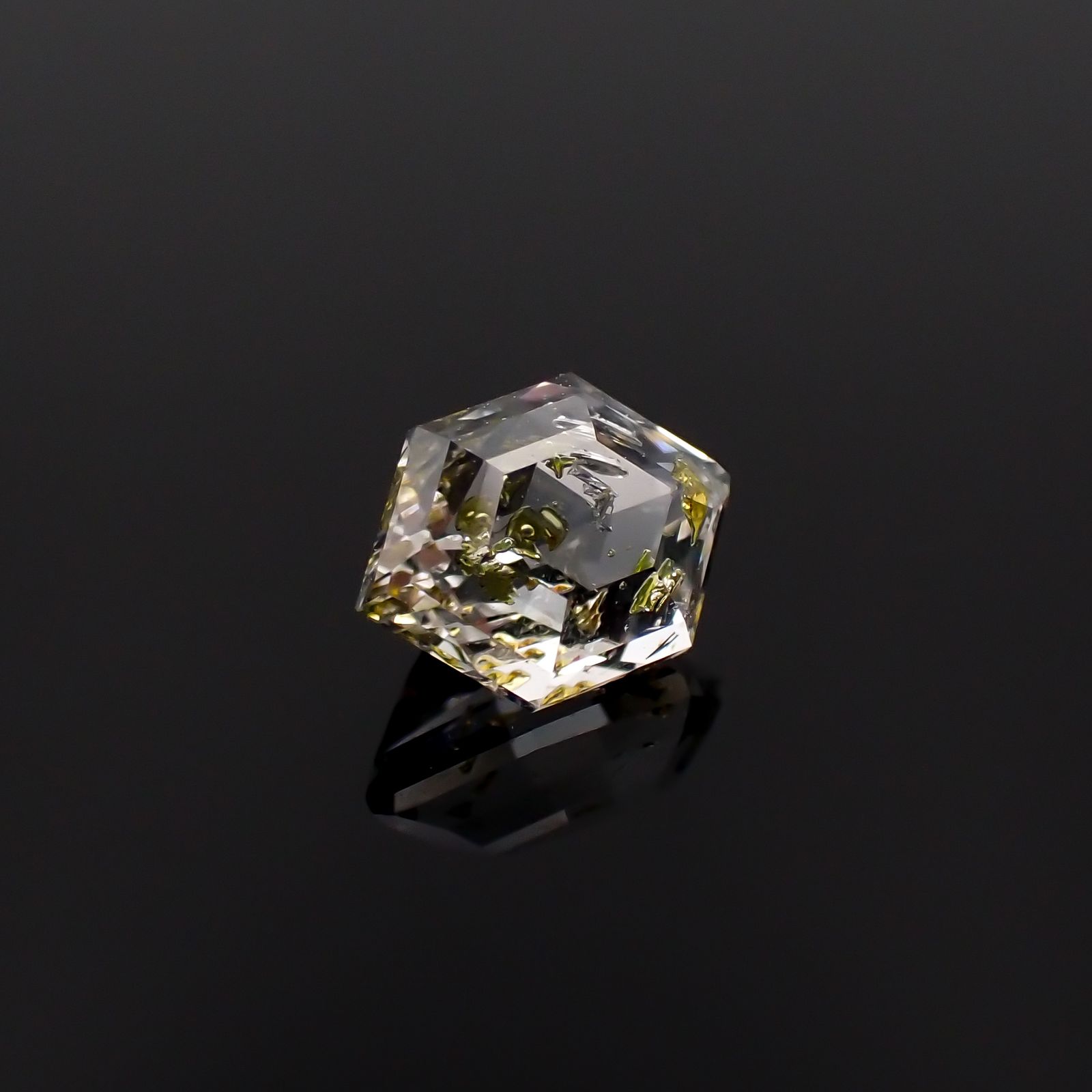 ◇カスタムカット◇オイルインクォーツ パキスタン産 0.64ct [230522096]6.6x4.7mm前後