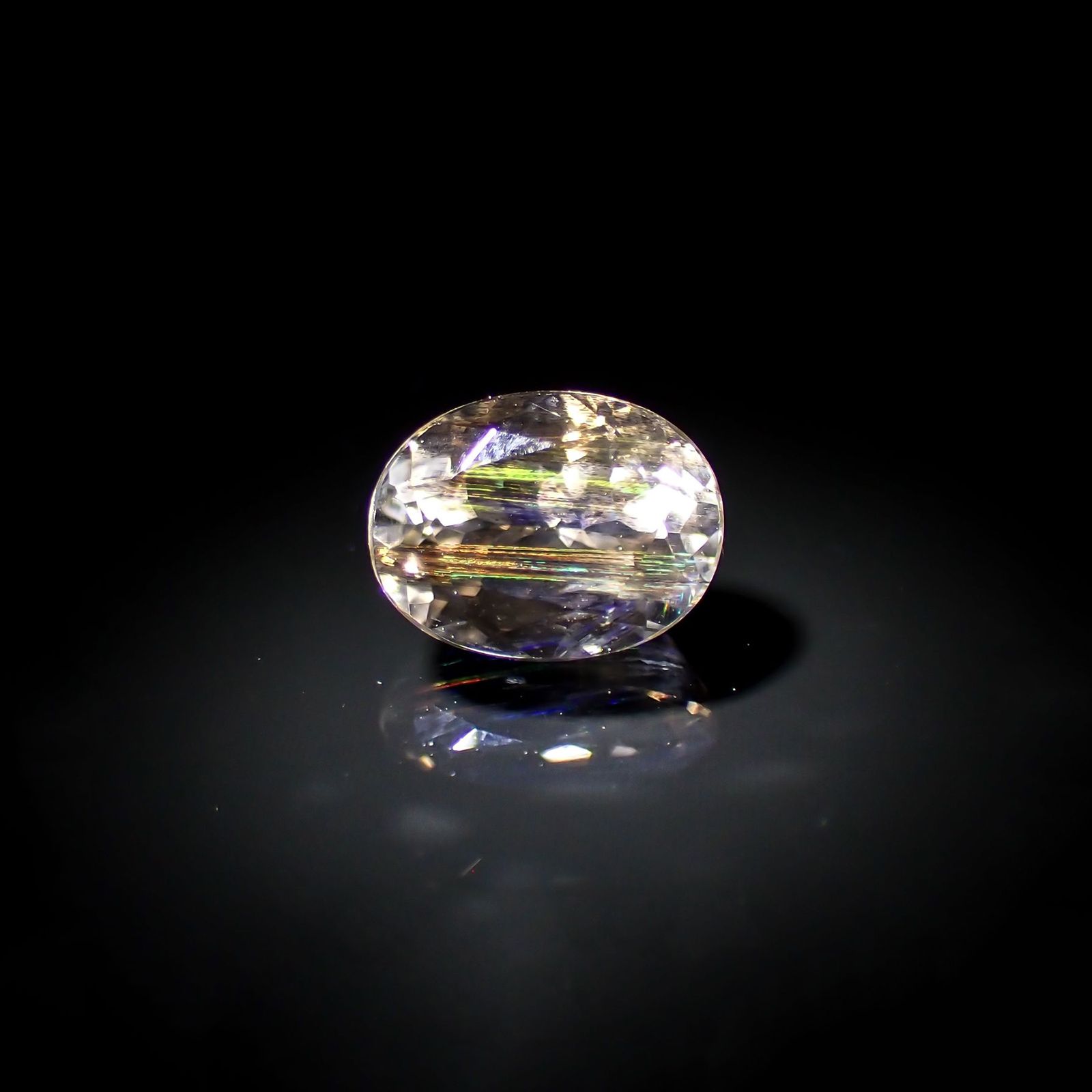 レインボースキャポライト(宝石名イリデッセント・スキャポライト) ブラジル産 識別済 1.42ct / 8.1×6mm前後 [210310340]