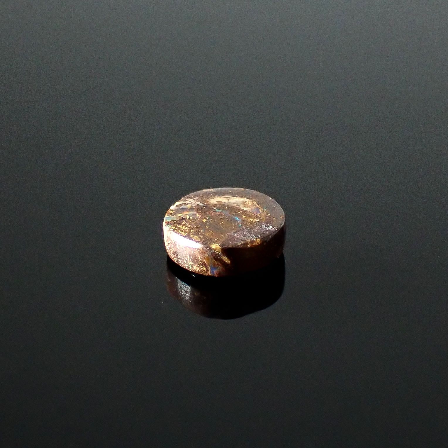 ウッドオパール オーストラリア産 0.52ct / 5.7x5.6mm前後 [251031195]