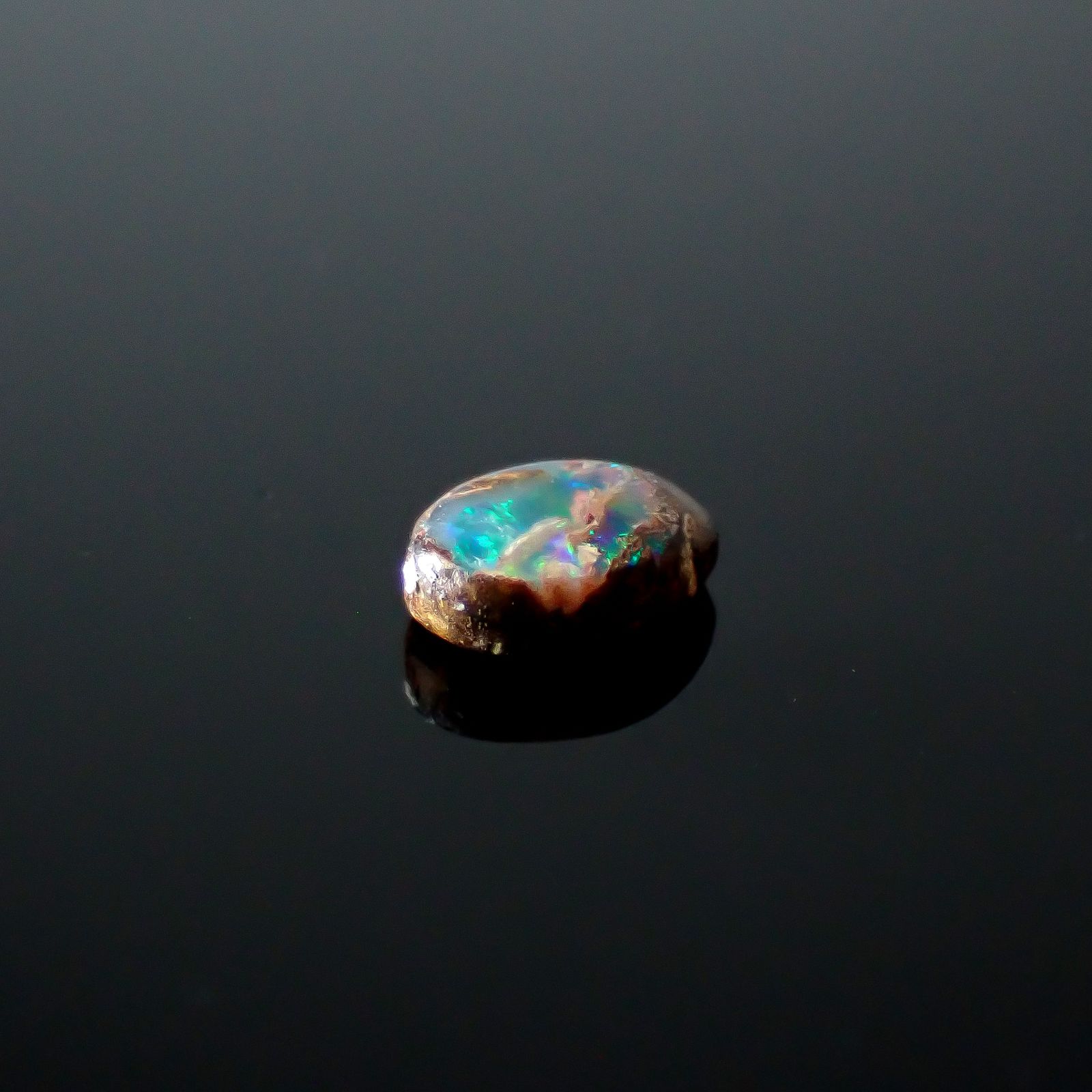 ウッドオパール オーストラリア産 0.21ct / 5x3.6mm前後 [251031198]