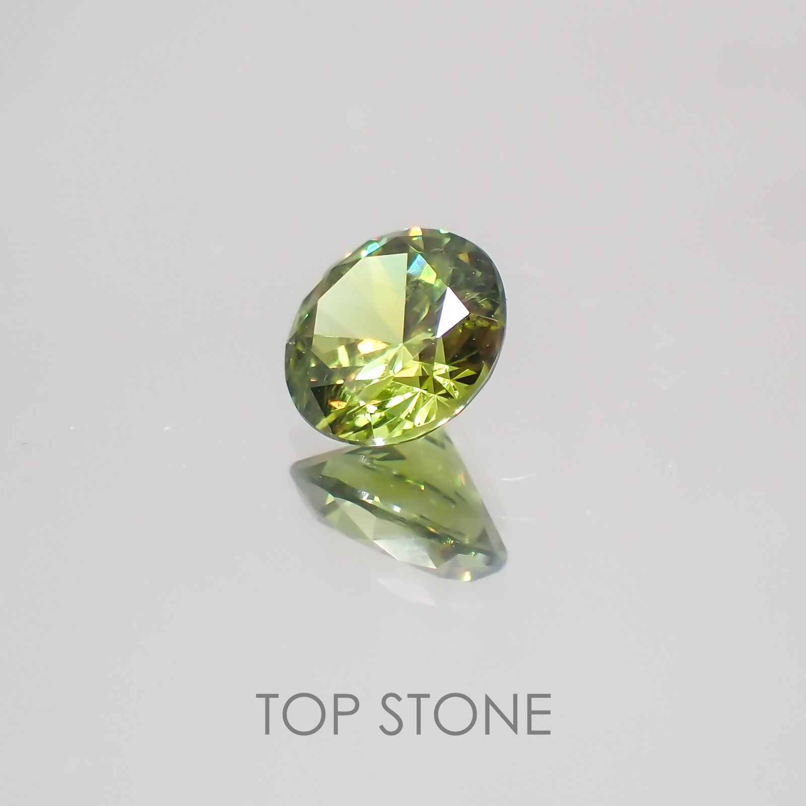 デマントイドガーネット(宝石名デマントイド・ガーネット)ロシア産 0.581ct ソ付(彩珠)[220717103]5.2x5.1mm前後